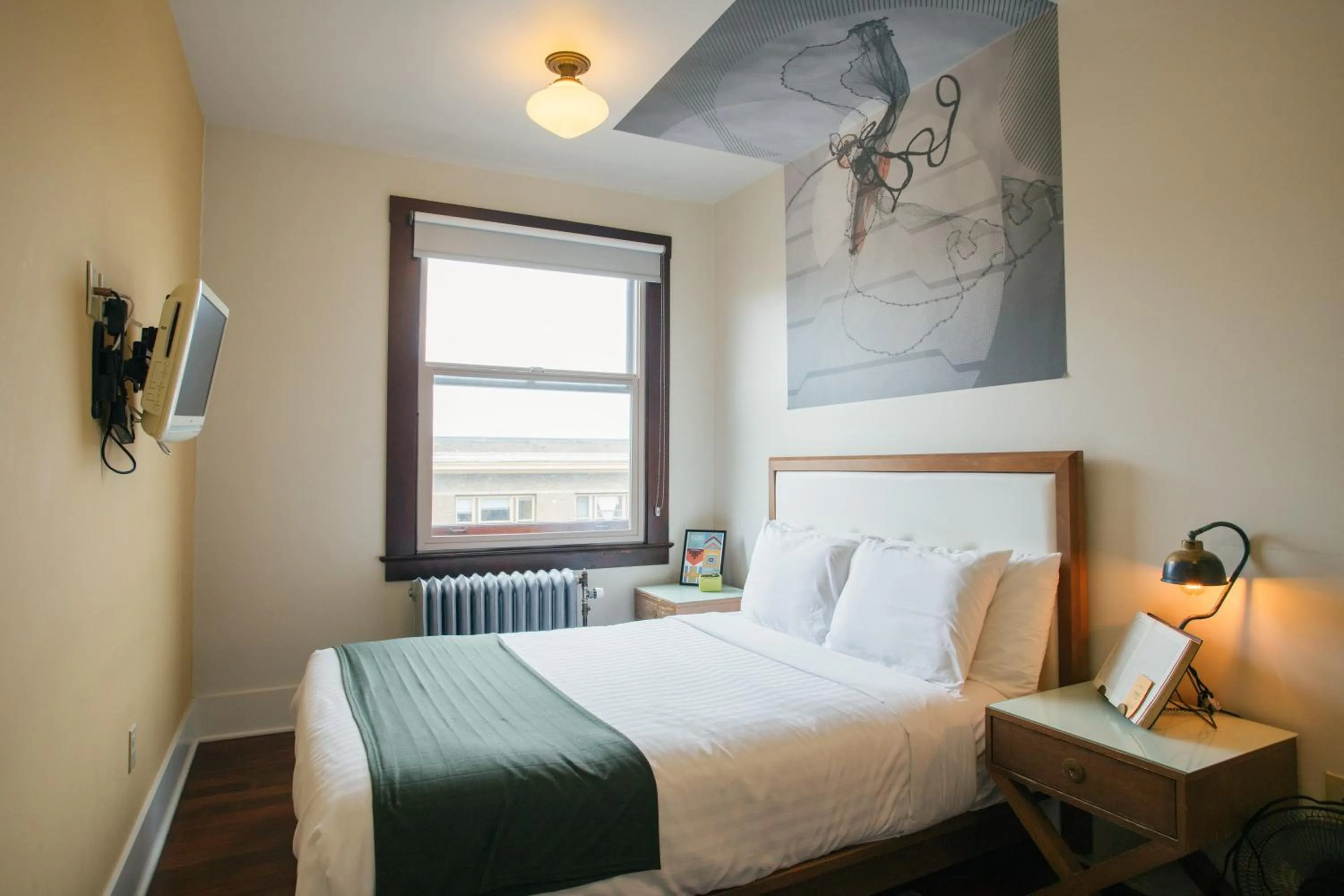 Bed in Commodore Hotel