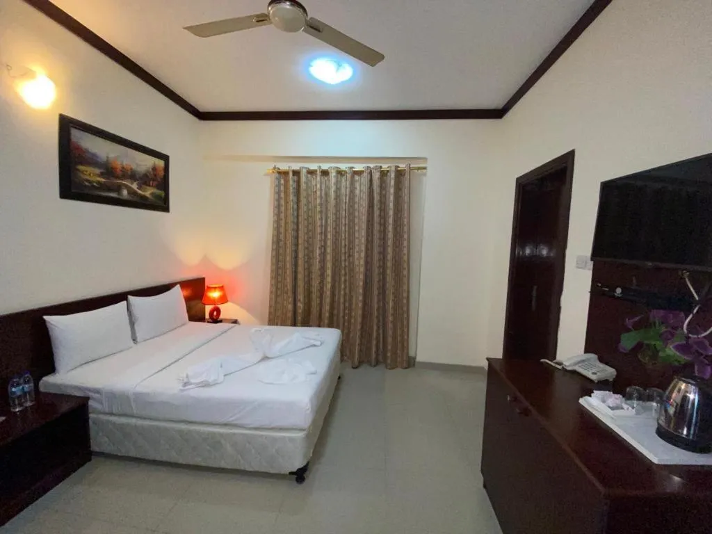 Photo of the whole room, Bed in Savoy Grand Hotel Apartments