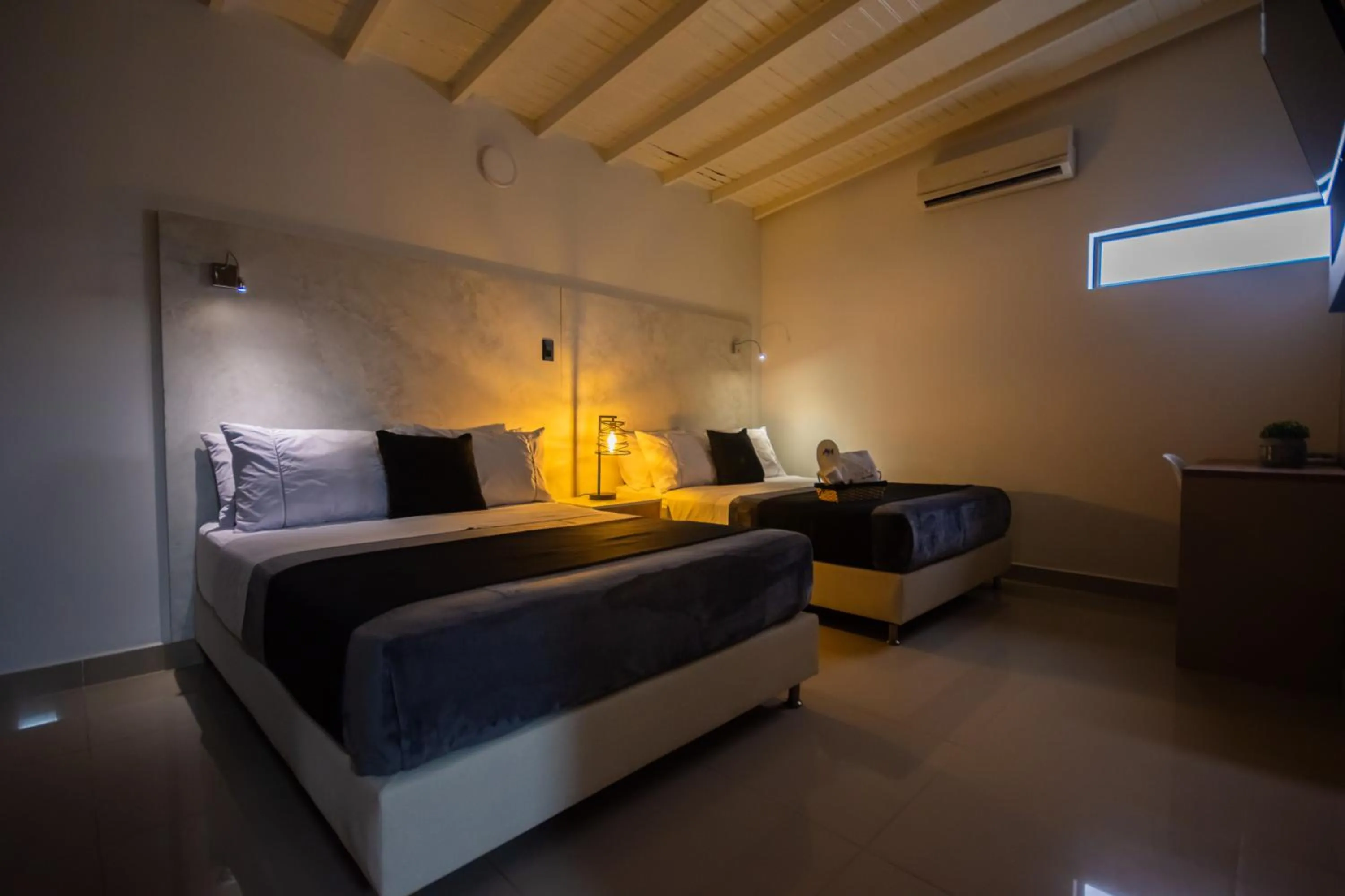 Photo of the whole room, Bed in Naiot Hotel Boutique