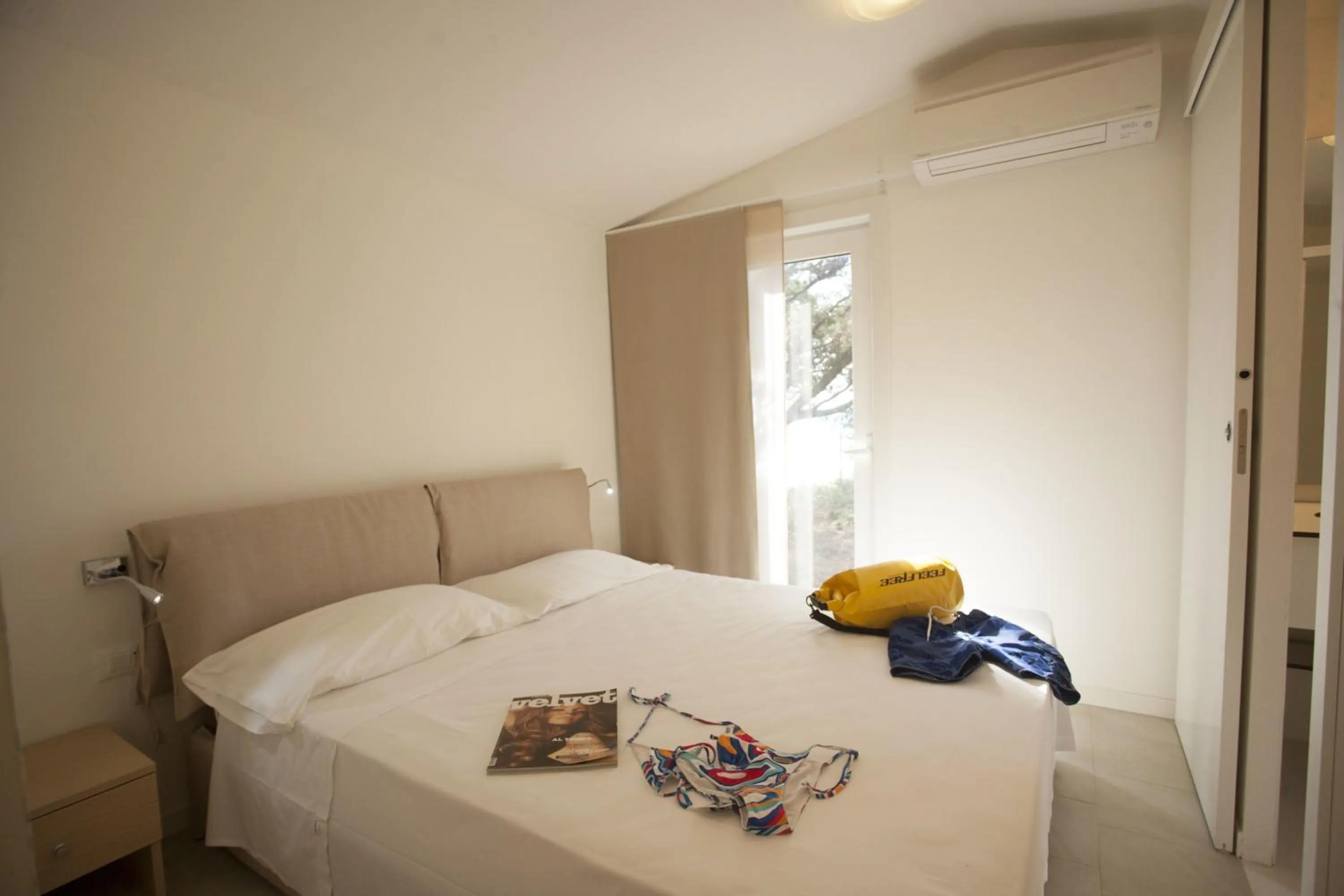 Bedroom in PuntAla Camp & Resort