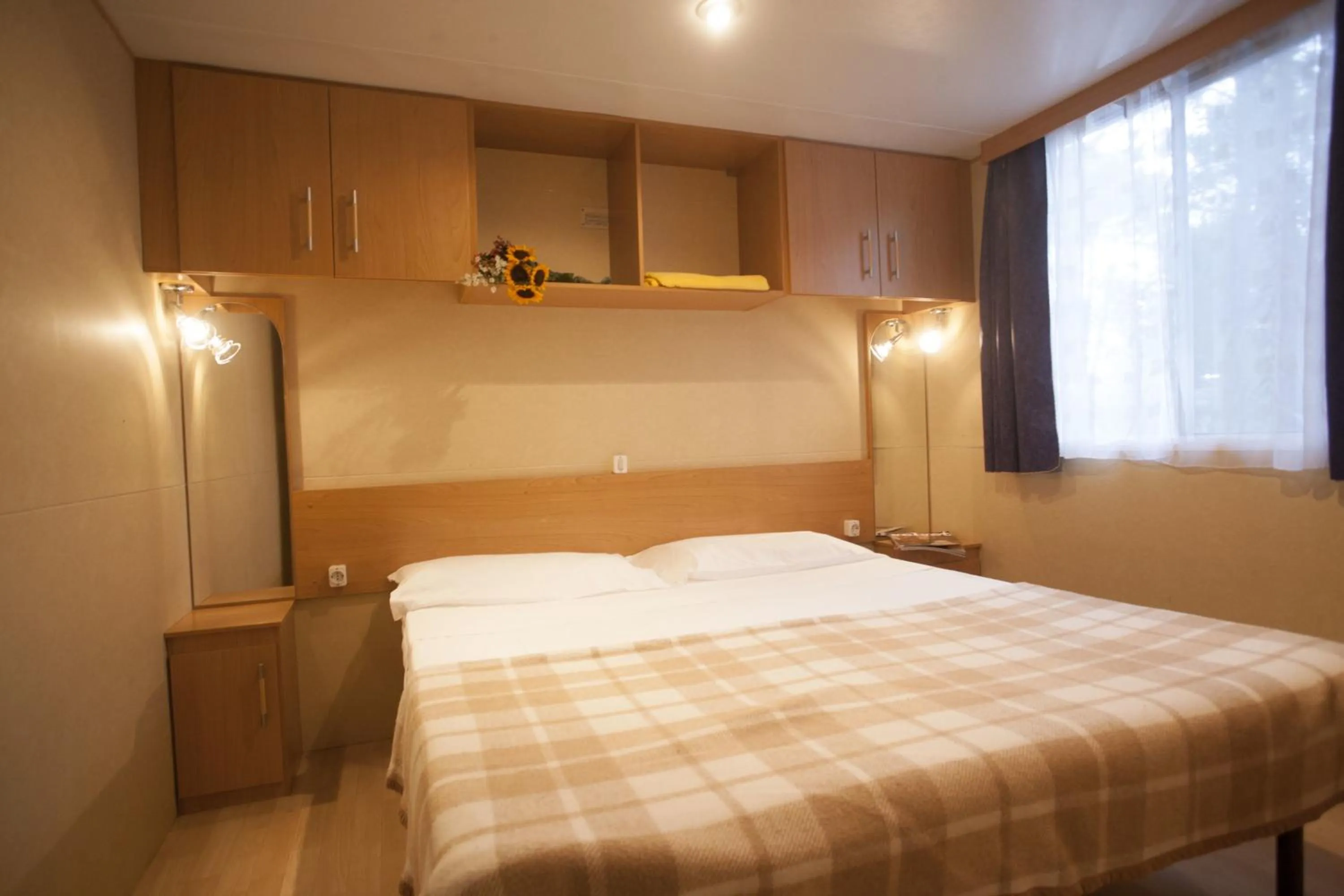 Bedroom in PuntAla Camp & Resort