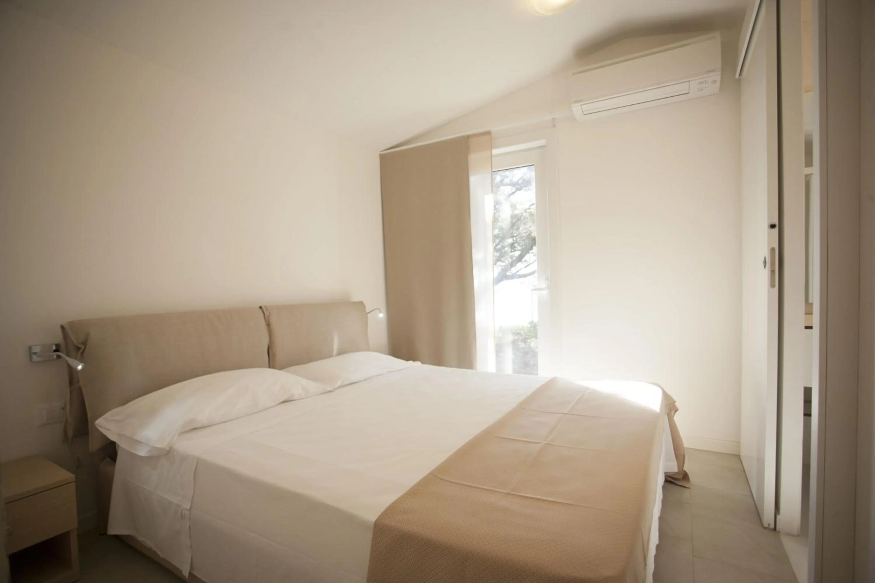 Bedroom in PuntAla Camp & Resort