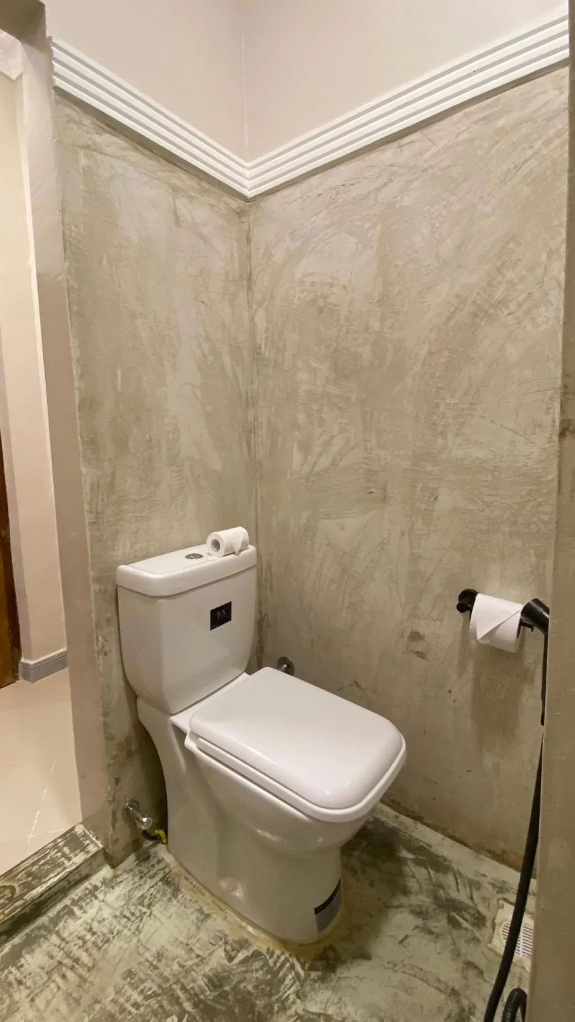 Toilet in Hanaia House