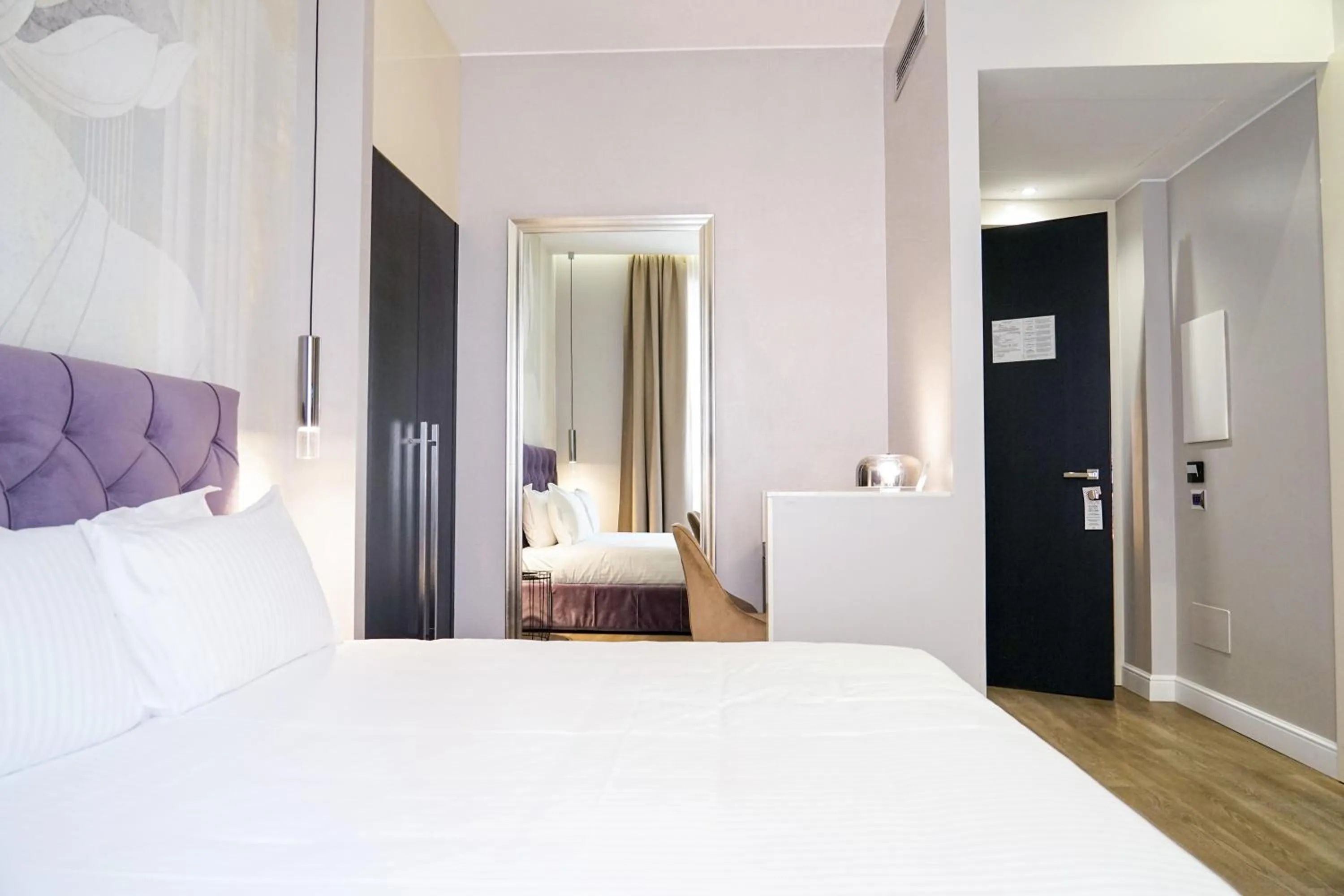 Bed in The Unique Hotel