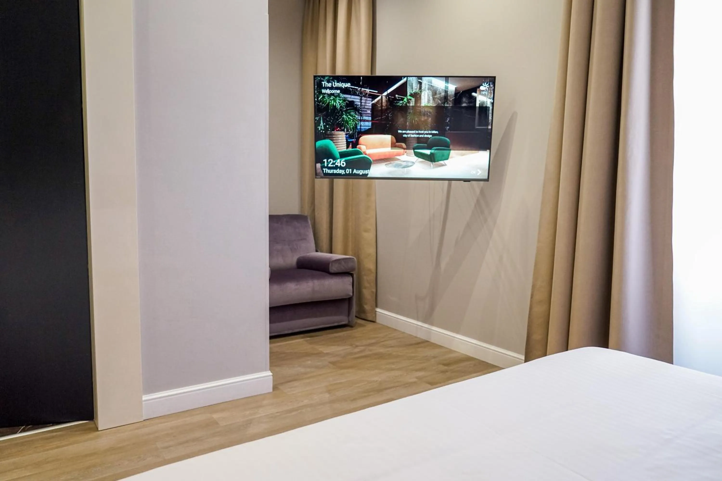 Bed in The Unique Hotel