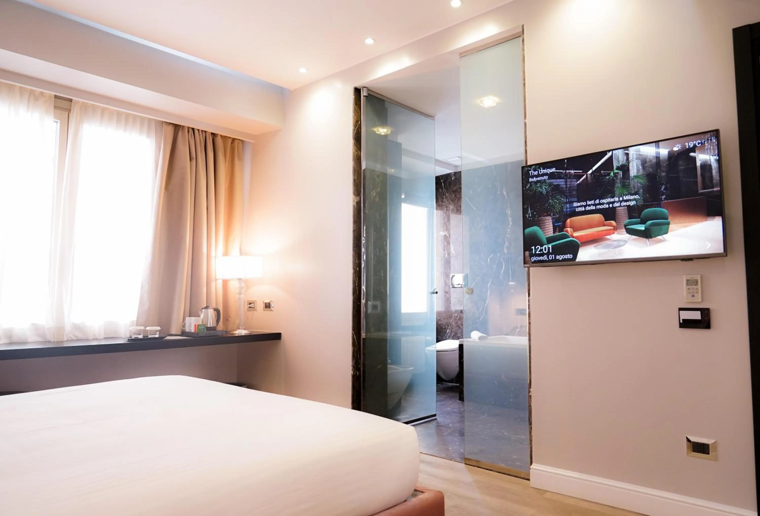 Bed in The Unique Hotel