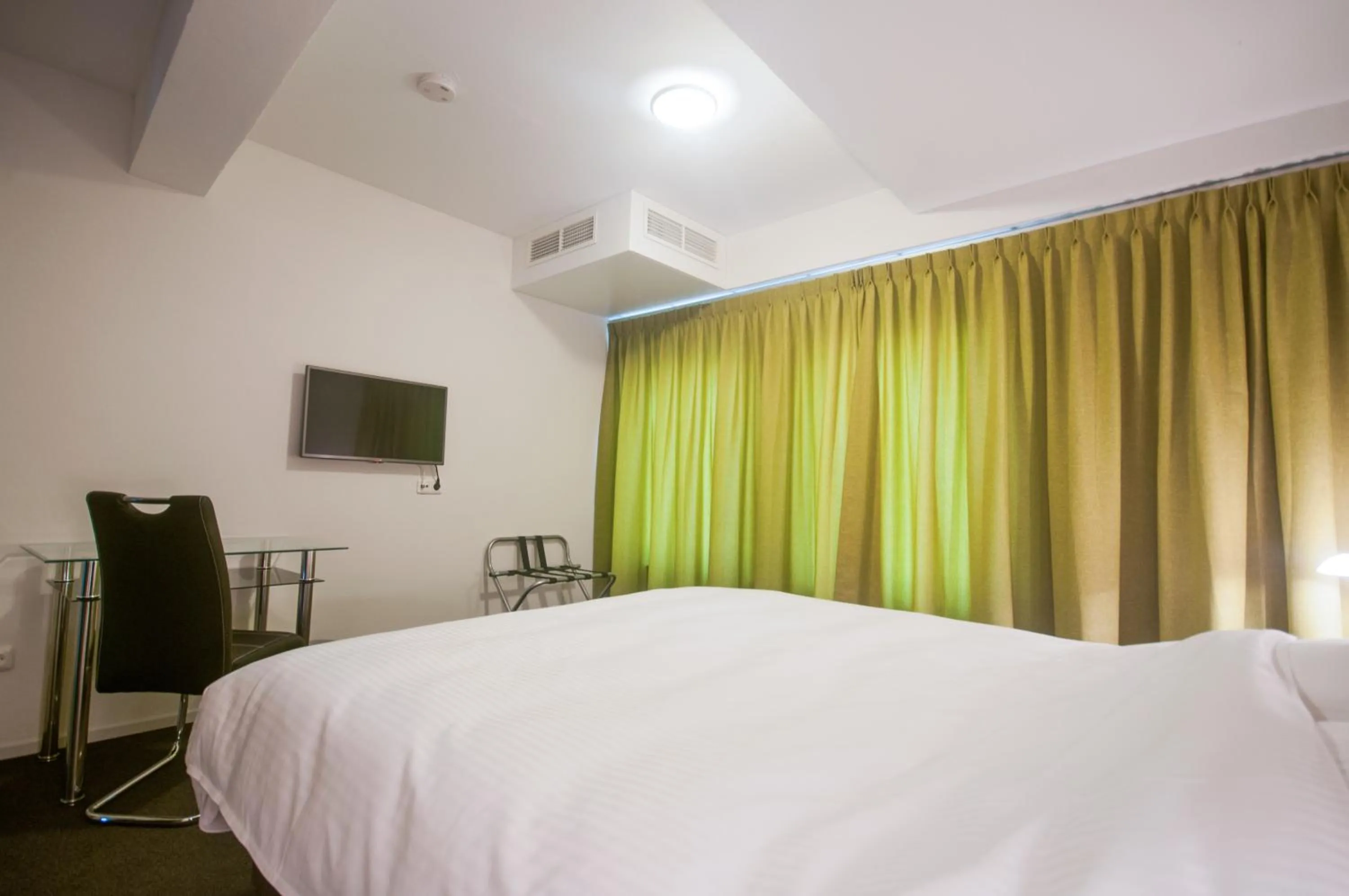 TV and multimedia, Bed in Hotel Taurus