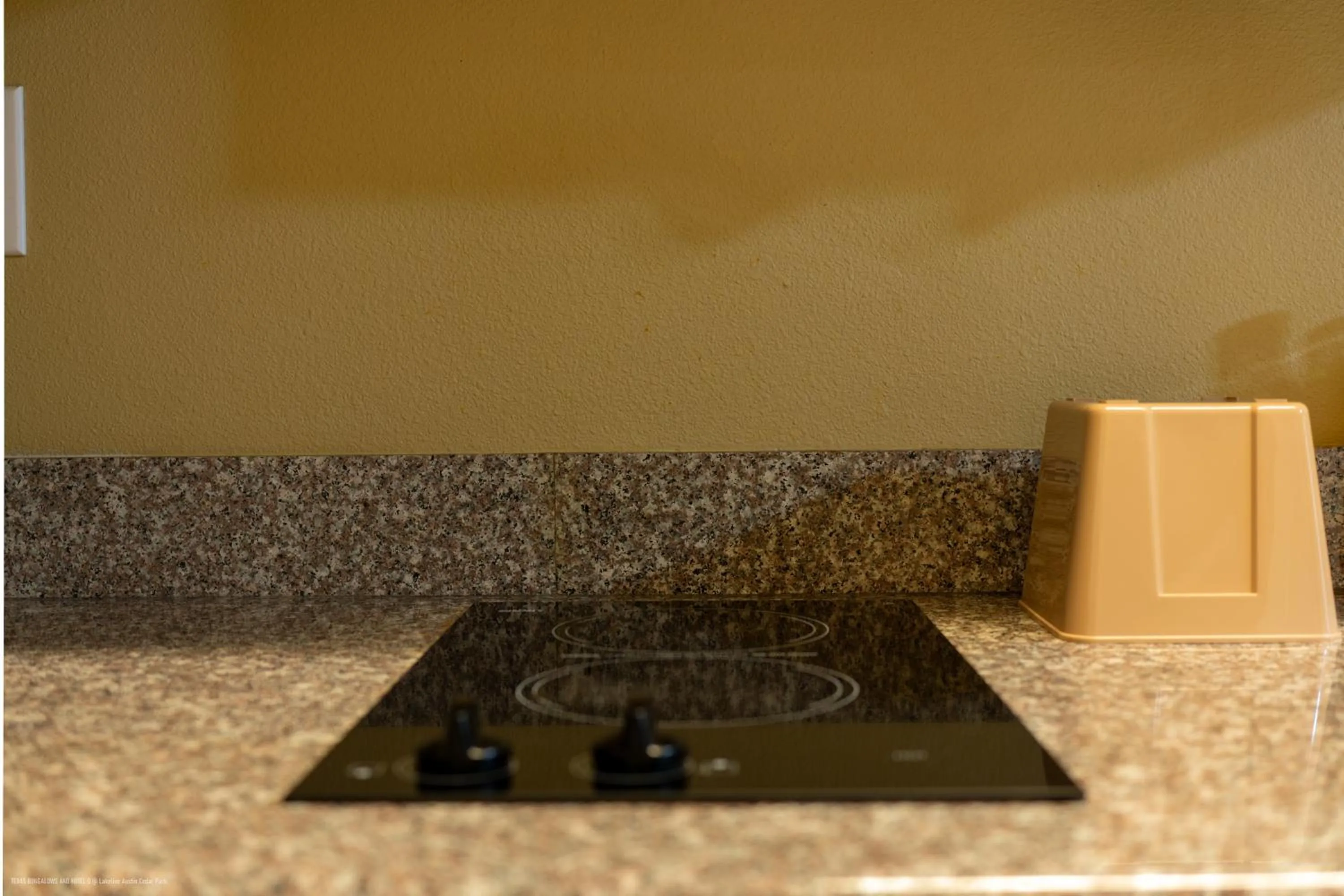 stove in Texas Bungalows Hotel & Hotel Que at Lakeline Austin Cedar Park