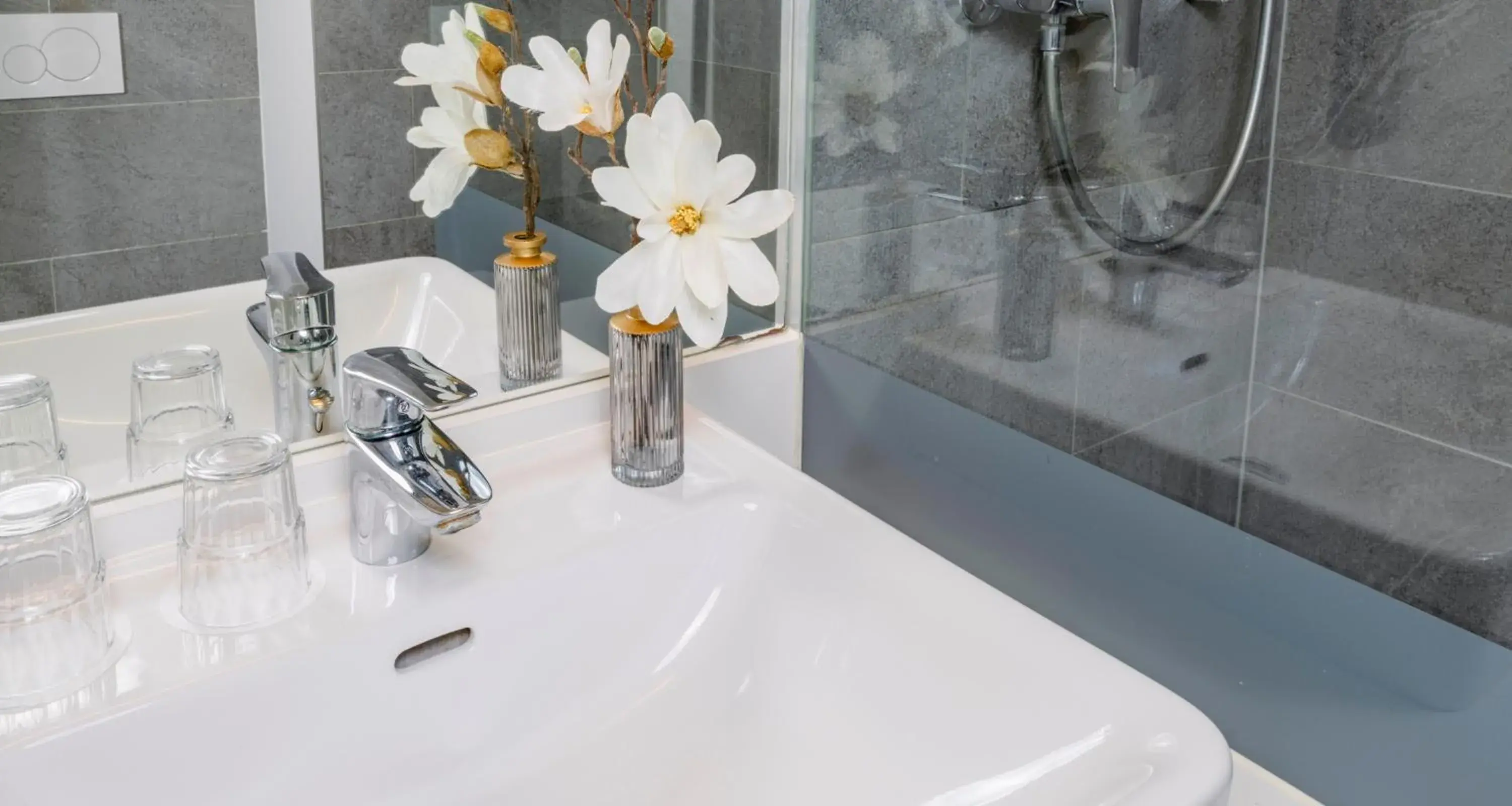 Bathroom in PLAZA INN Dachau - München Bathroom in PLAZA INN Dachau - München