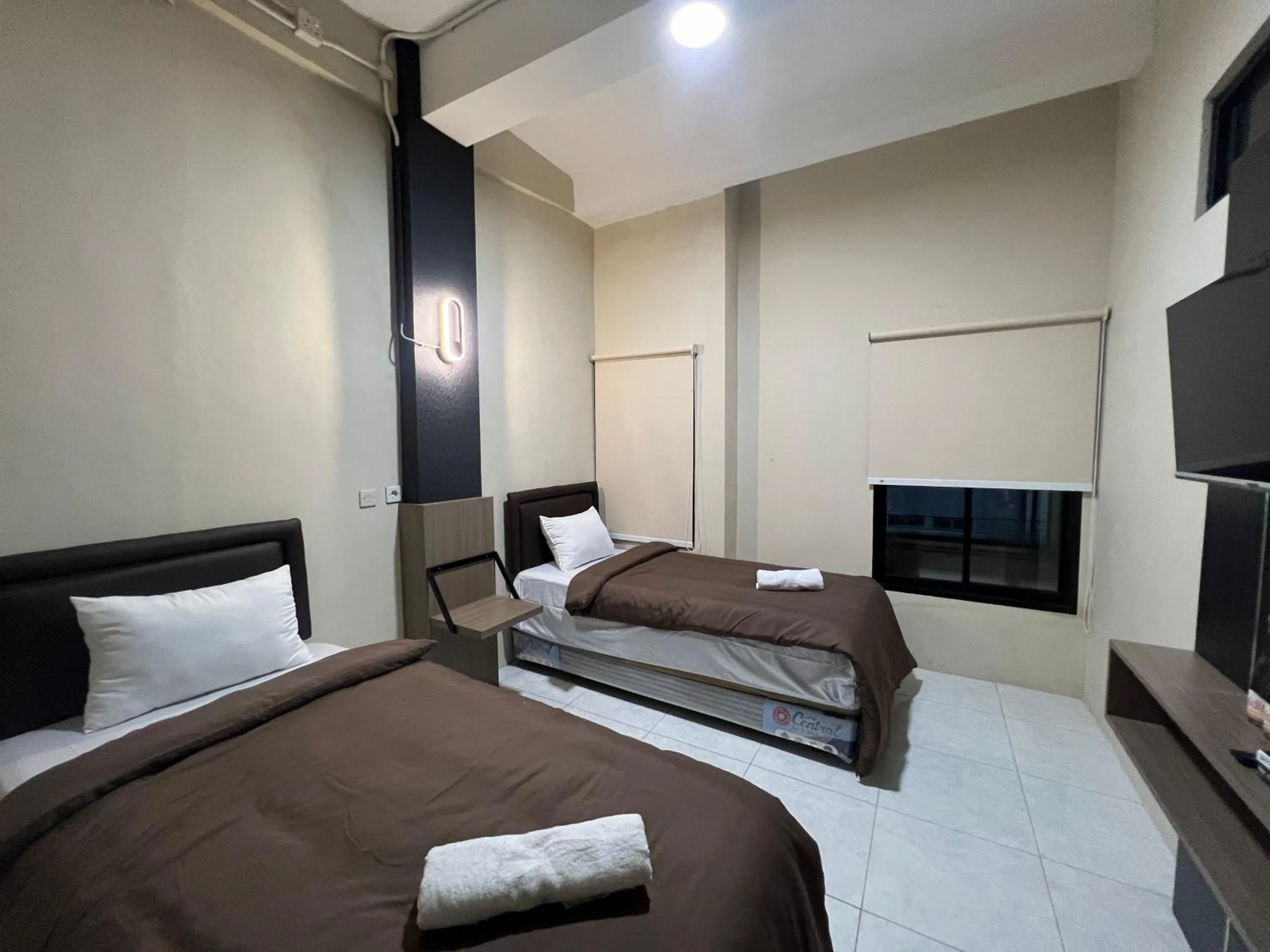 Bed in Brenn Hotel Semarang Mitra Reddoorz