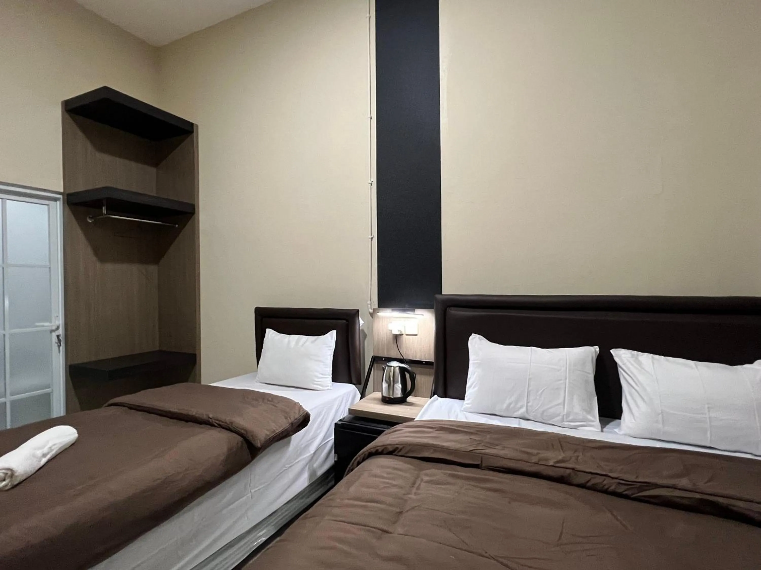 Bed in Brenn Hotel Semarang Mitra Reddoorz