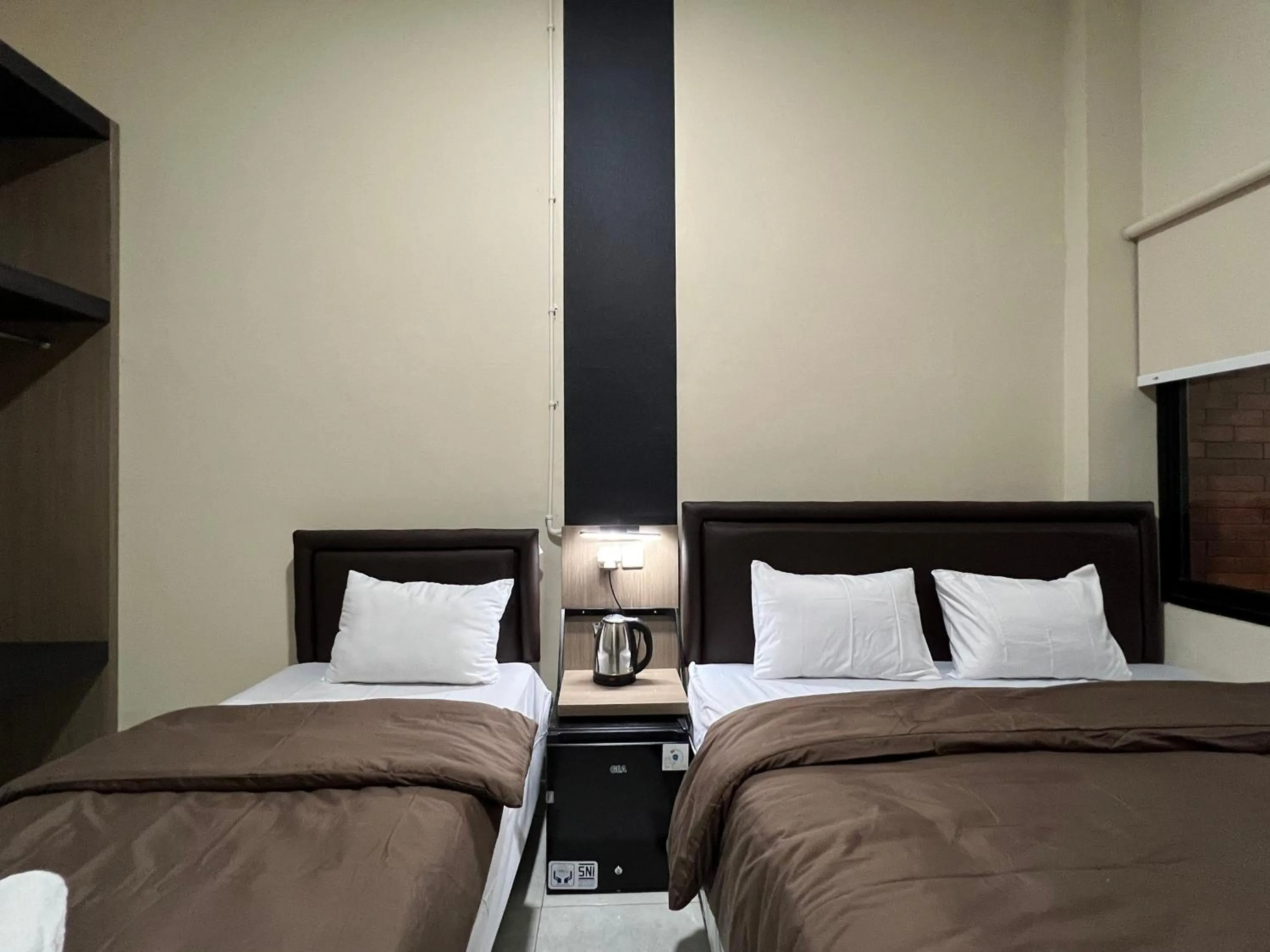 Bed in Brenn Hotel Semarang Mitra Reddoorz