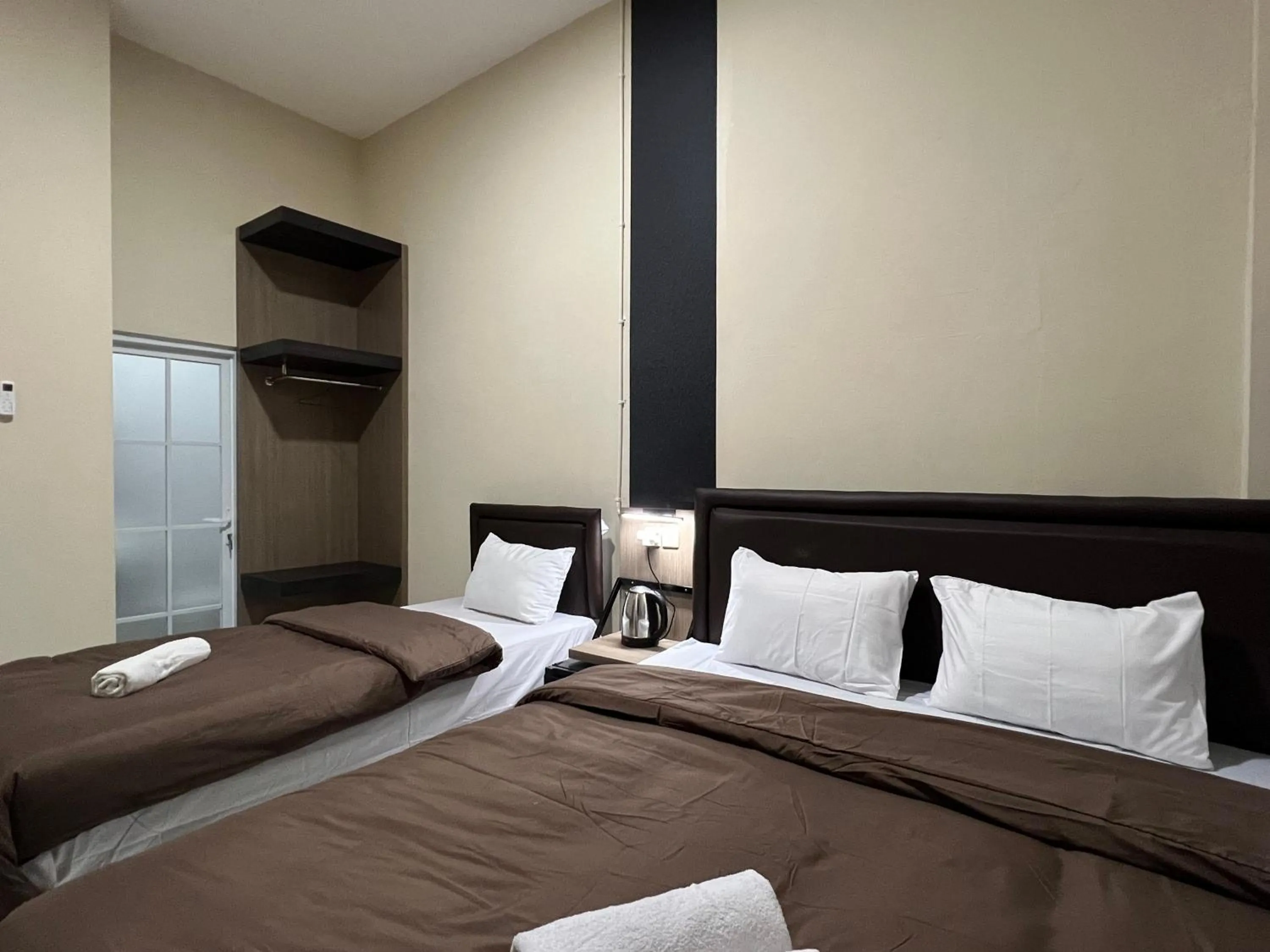 Bed in Brenn Hotel Semarang Mitra Reddoorz