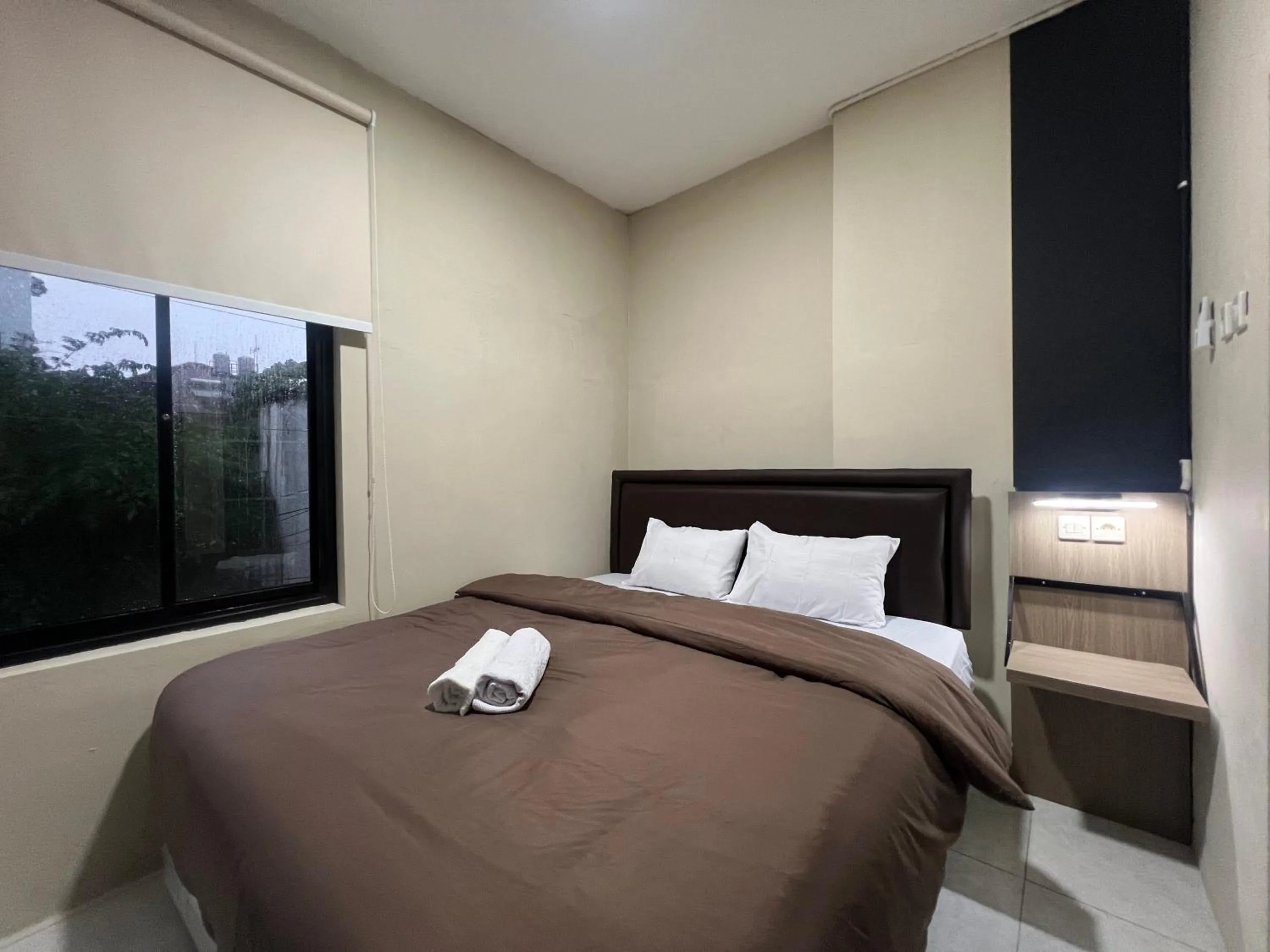 Bed in Brenn Hotel Semarang Mitra Reddoorz