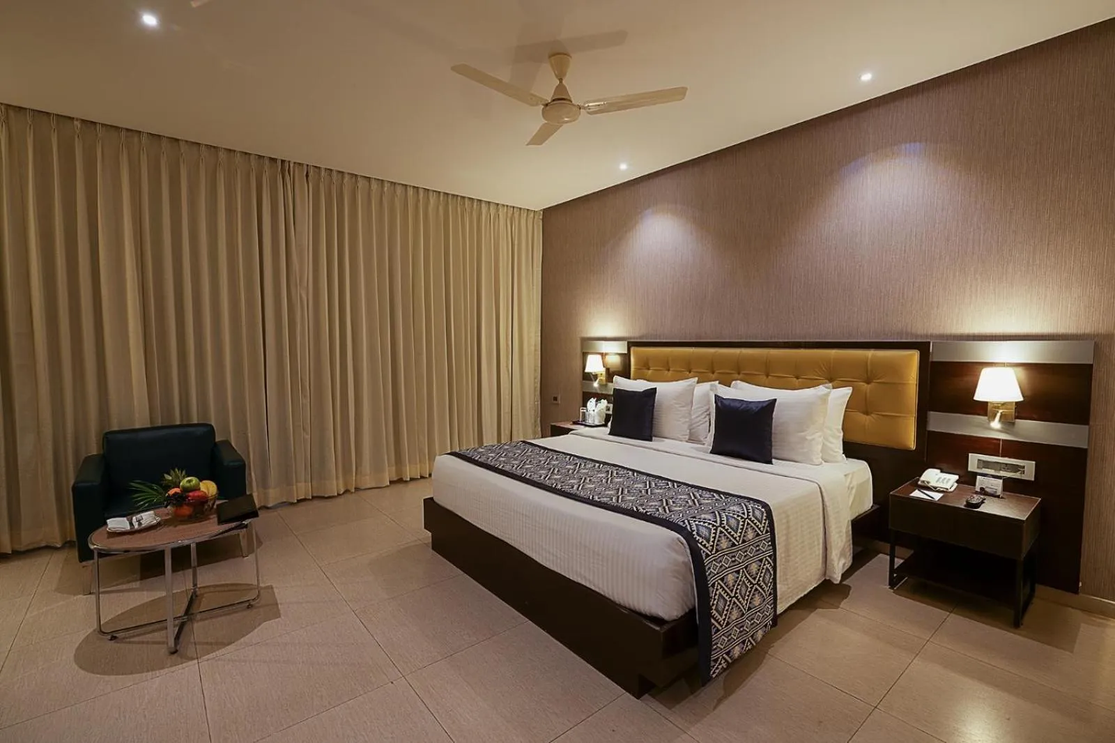 Bedroom, Bed in Grand Continent Malleshwaram A Sarovar Portico Affiliate Hotel