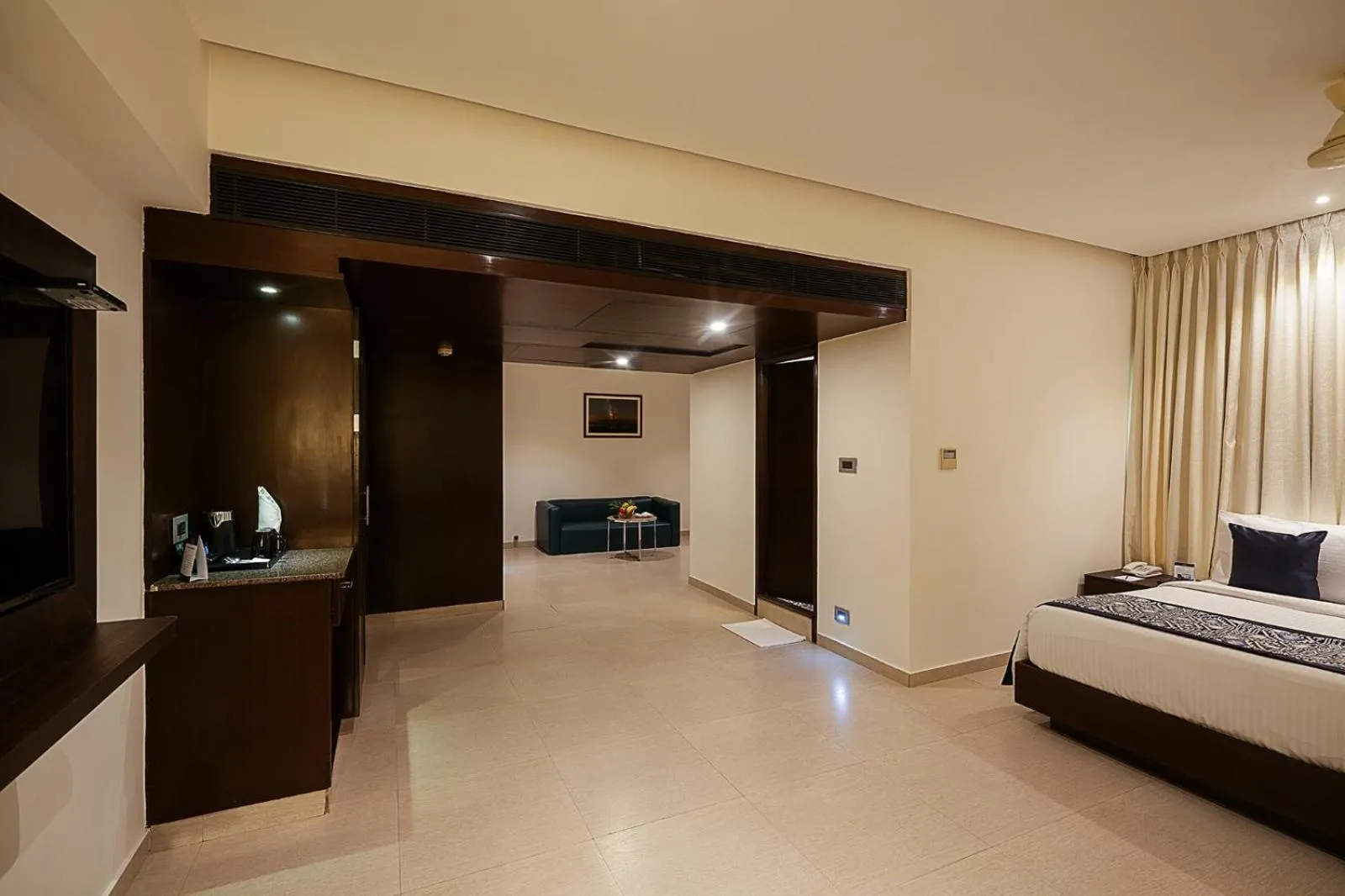 Bedroom, Bed in Grand Continent Malleshwaram A Sarovar Portico Affiliate Hotel