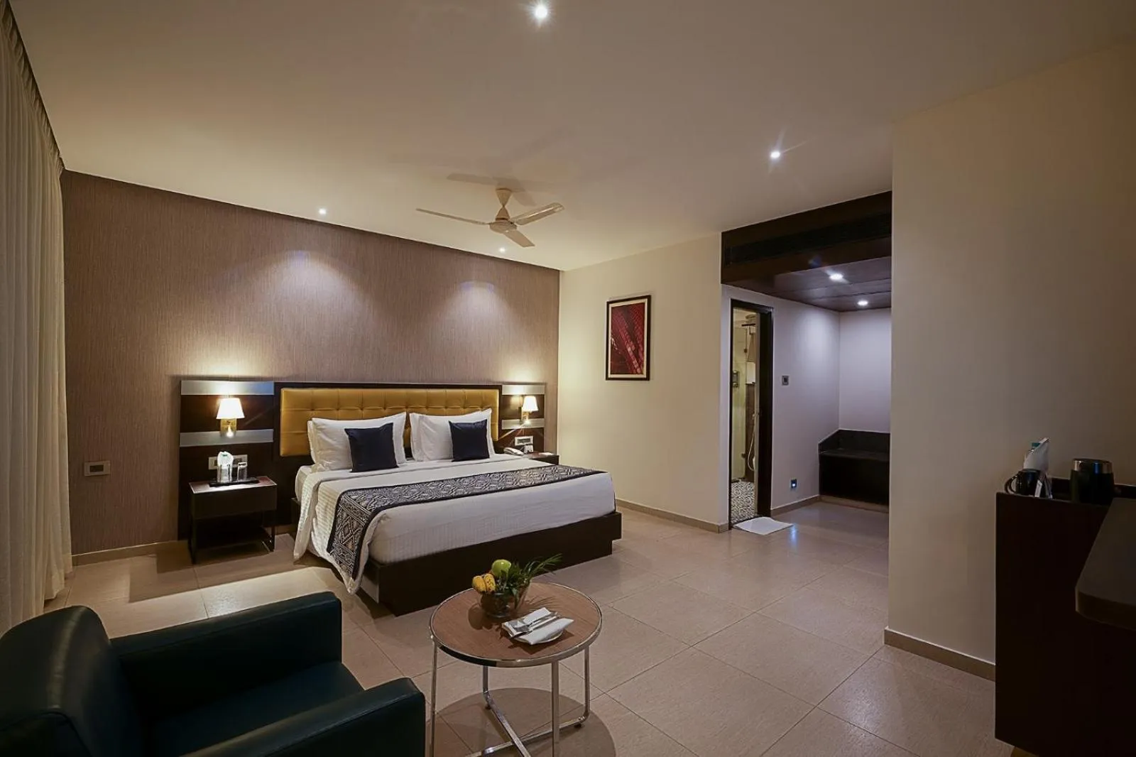 Photo of the whole room, Bed in Grand Continent Malleshwaram A Sarovar Portico Affiliate Hotel