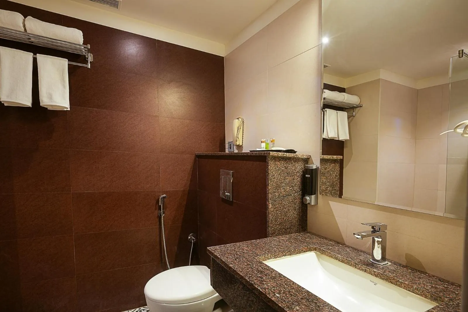 Bathroom in Grand Continent Malleshwaram A Sarovar Portico Affiliate Hotel