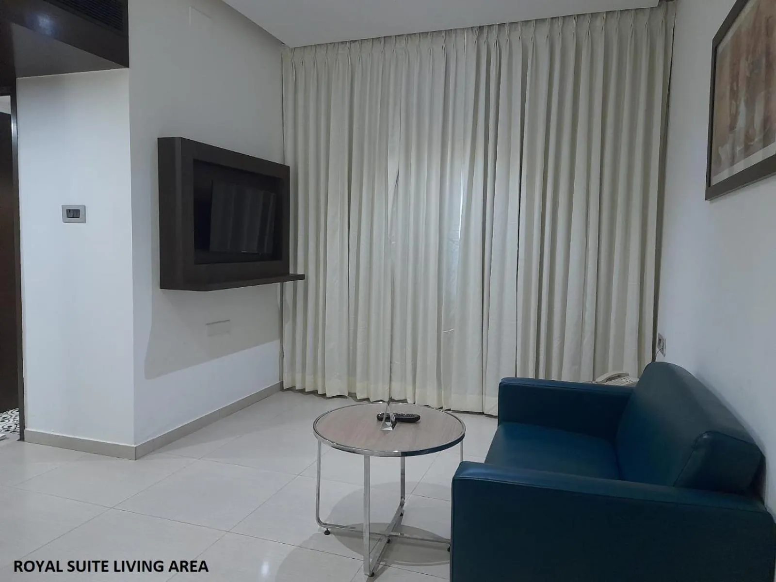 Seating area in Grand Continent Malleshwaram A Sarovar Portico Affiliate Hotel