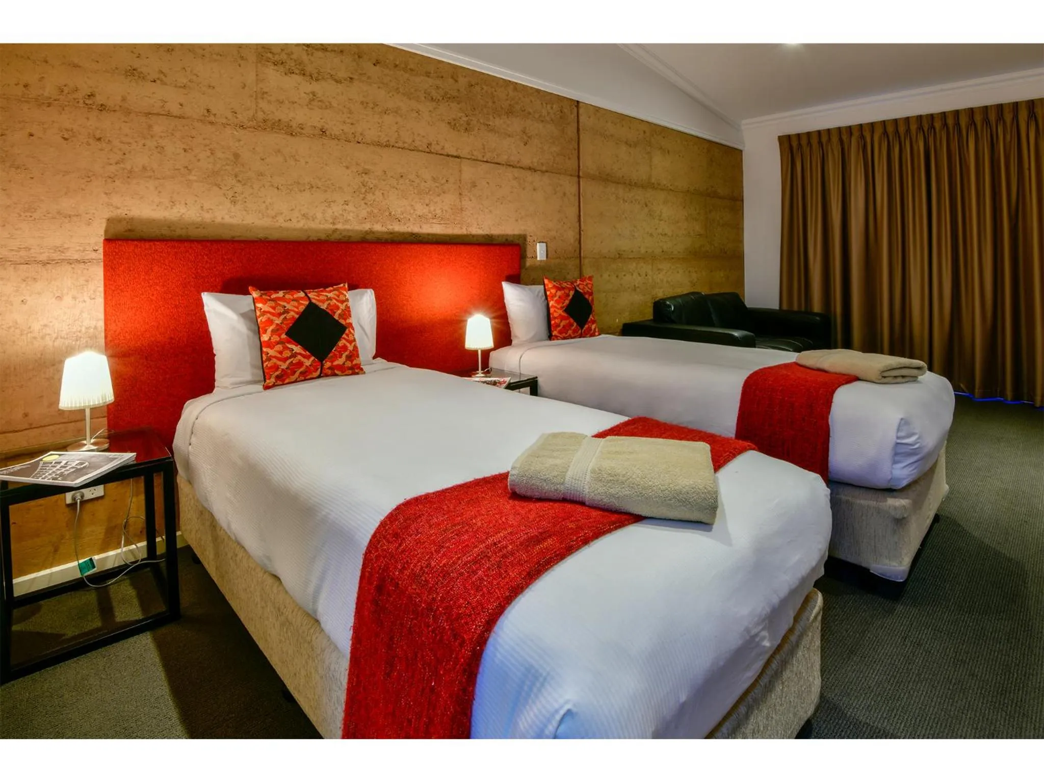 Bed in Crossroads Ecomotel