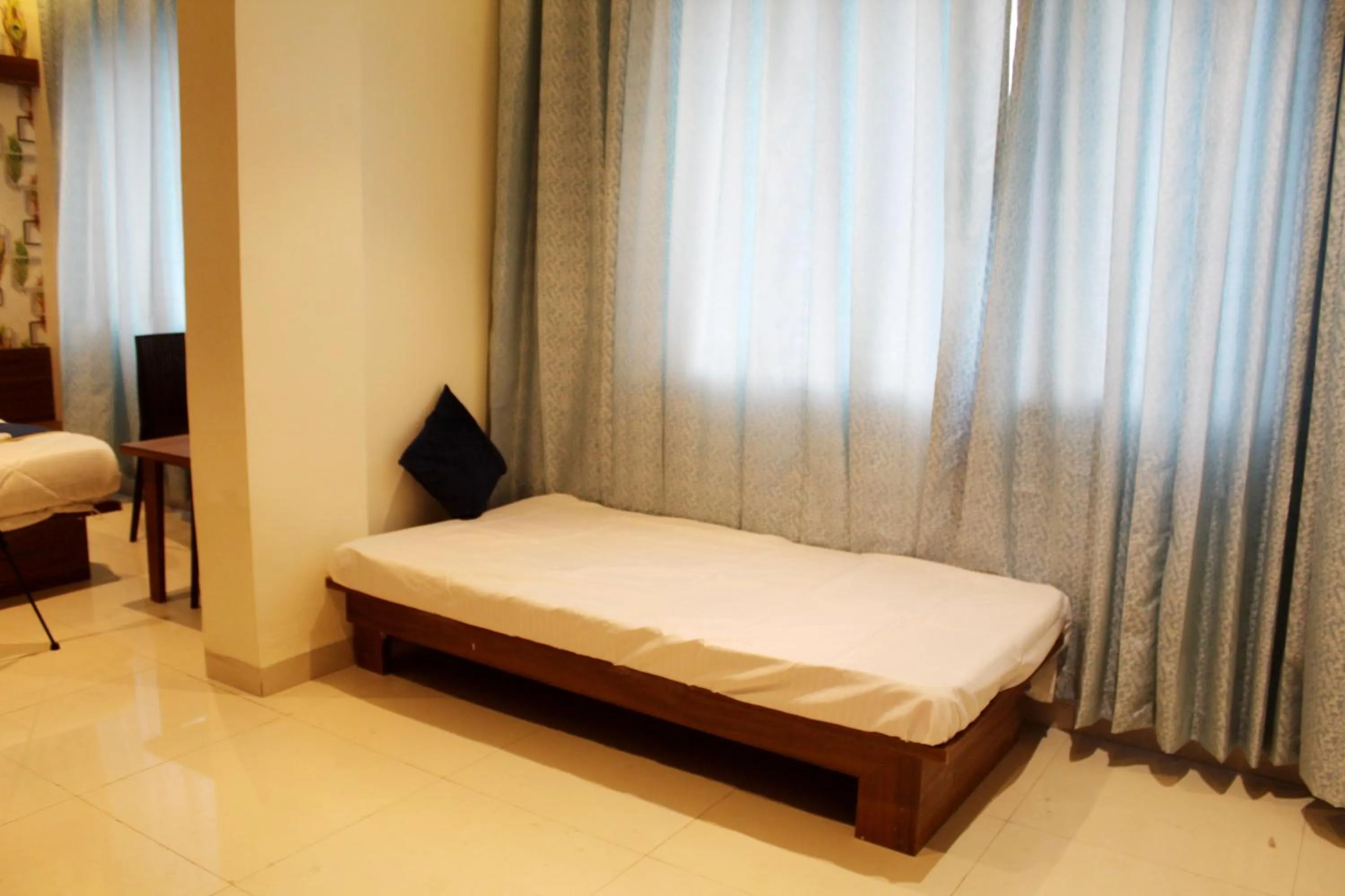 Bed in Hotel India Gate Narhe, Pune