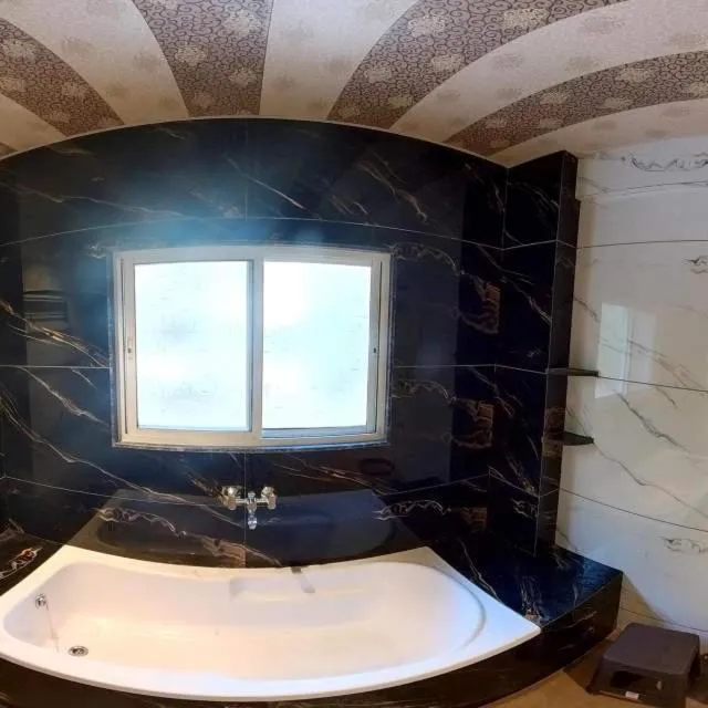 Bathroom in Hotel India Gate Narhe, Pune