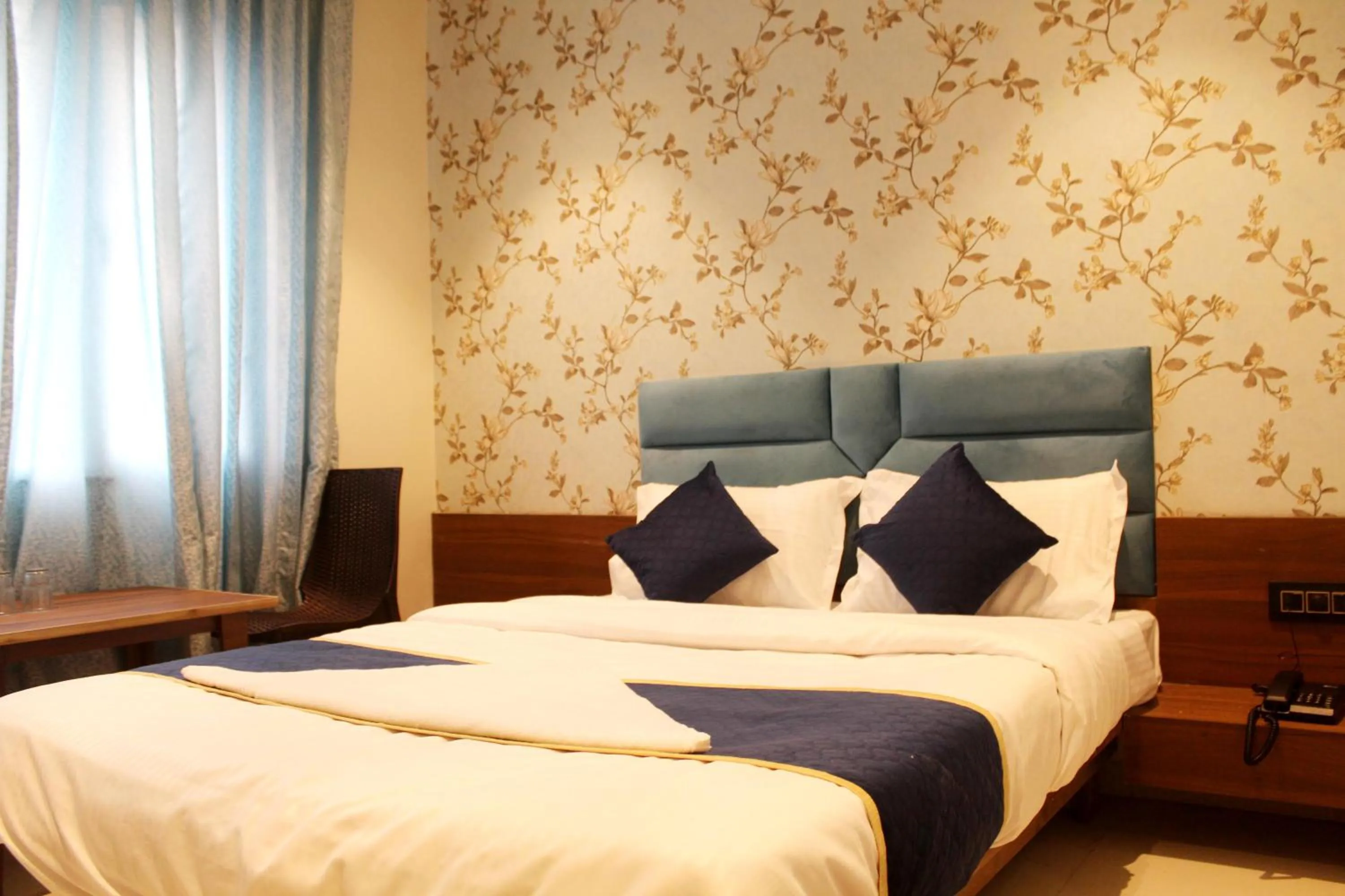 Bed in Hotel India Gate Narhe, Pune