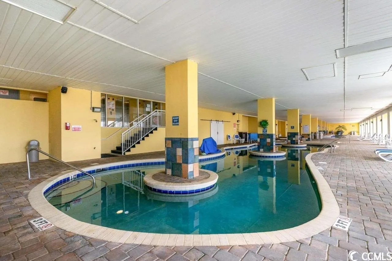 Swimming pool in Camelot By The Sea - Blue Palmetto Vacation Rentals
