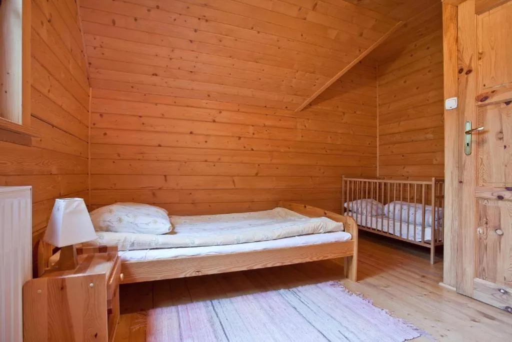 Bed in Apartamenty z kominkiem w Krynicy