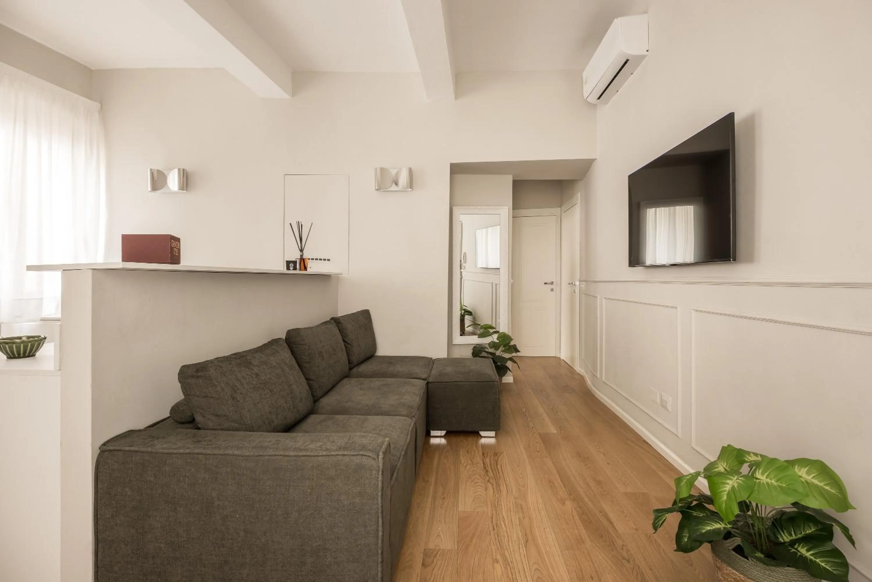 Living room in Tornabuoni Place by Mmega