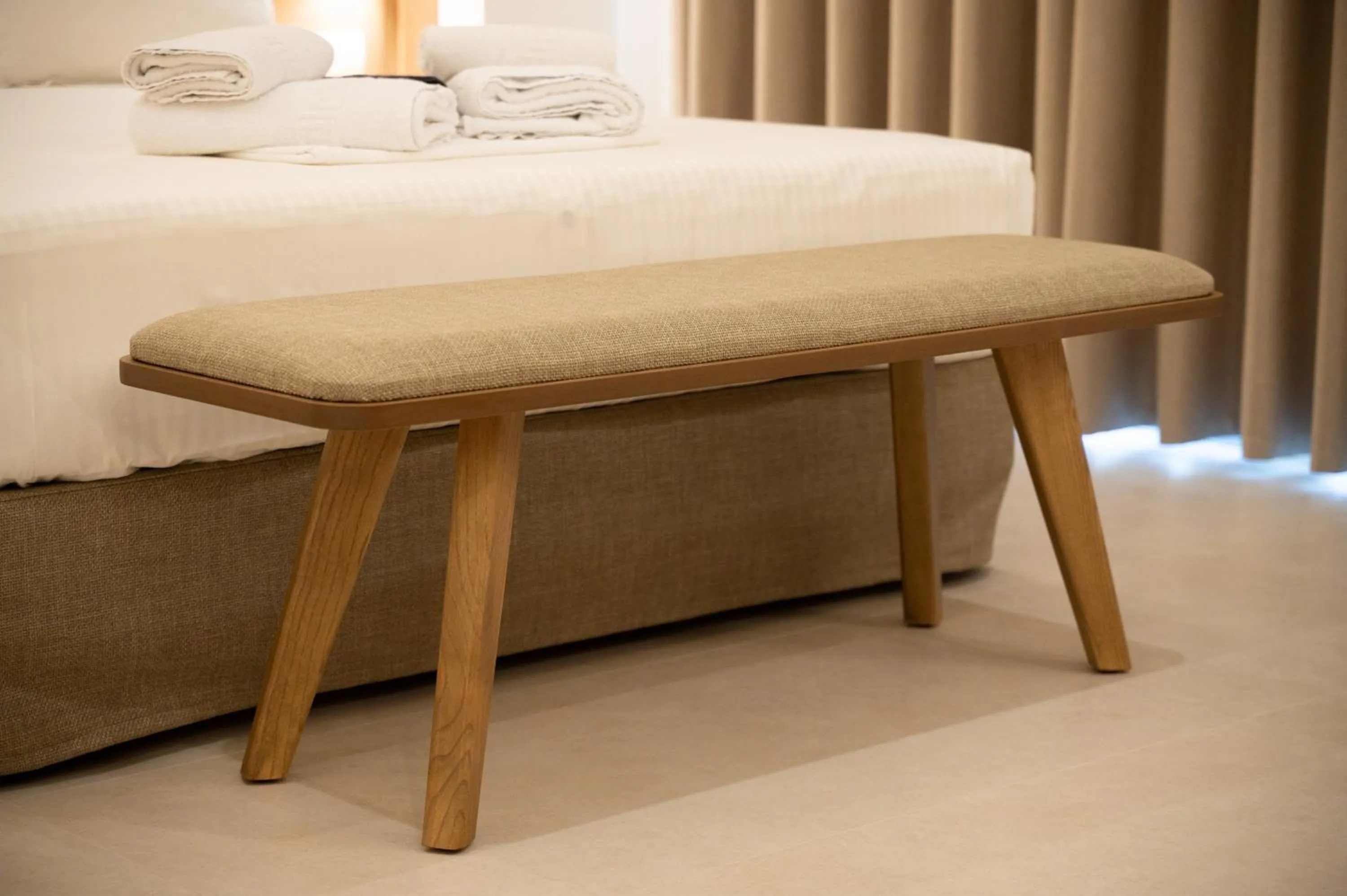 Bed in Sunrise SeaSide Suites