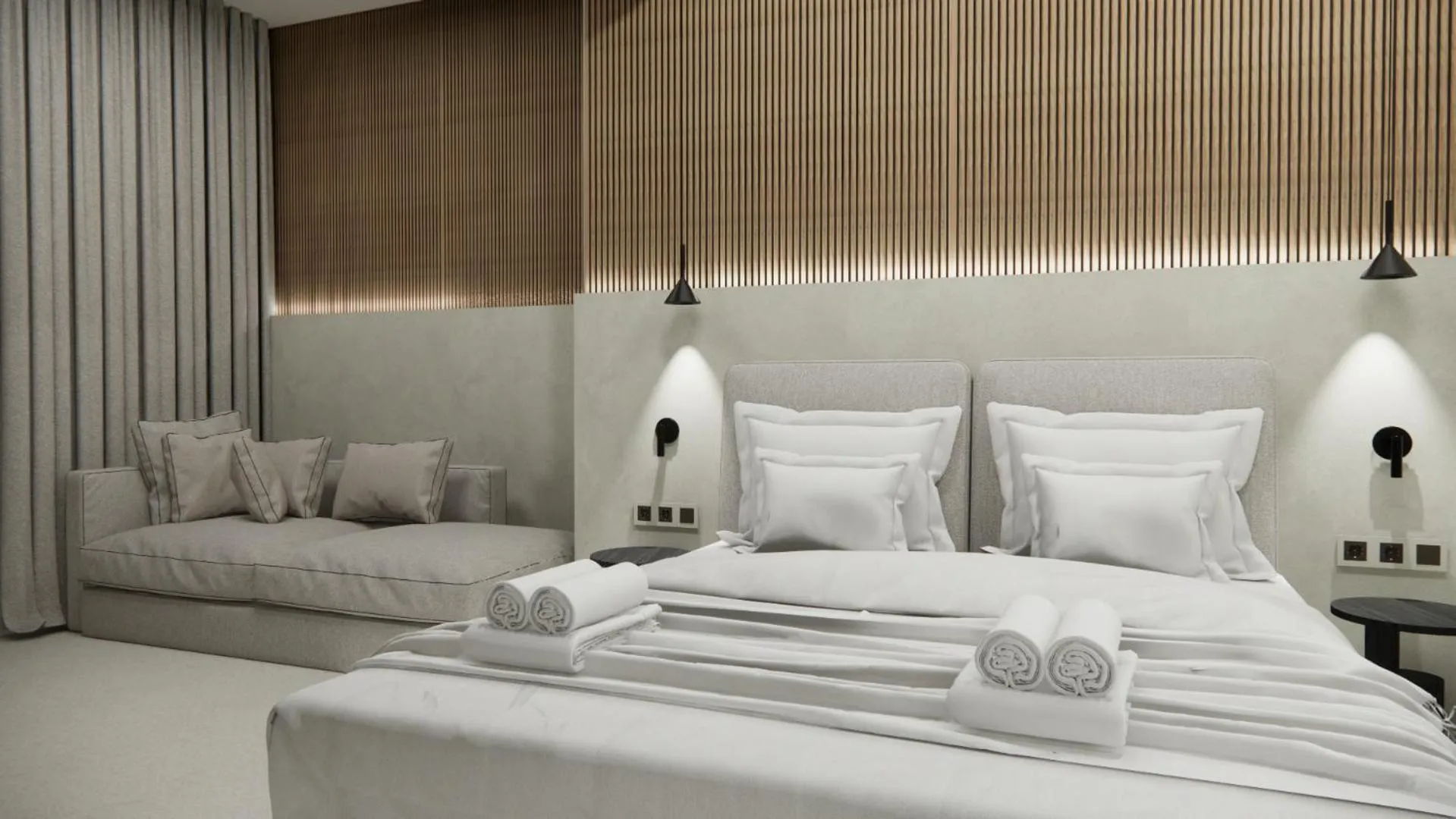 Bed in Sunrise SeaSide Suites