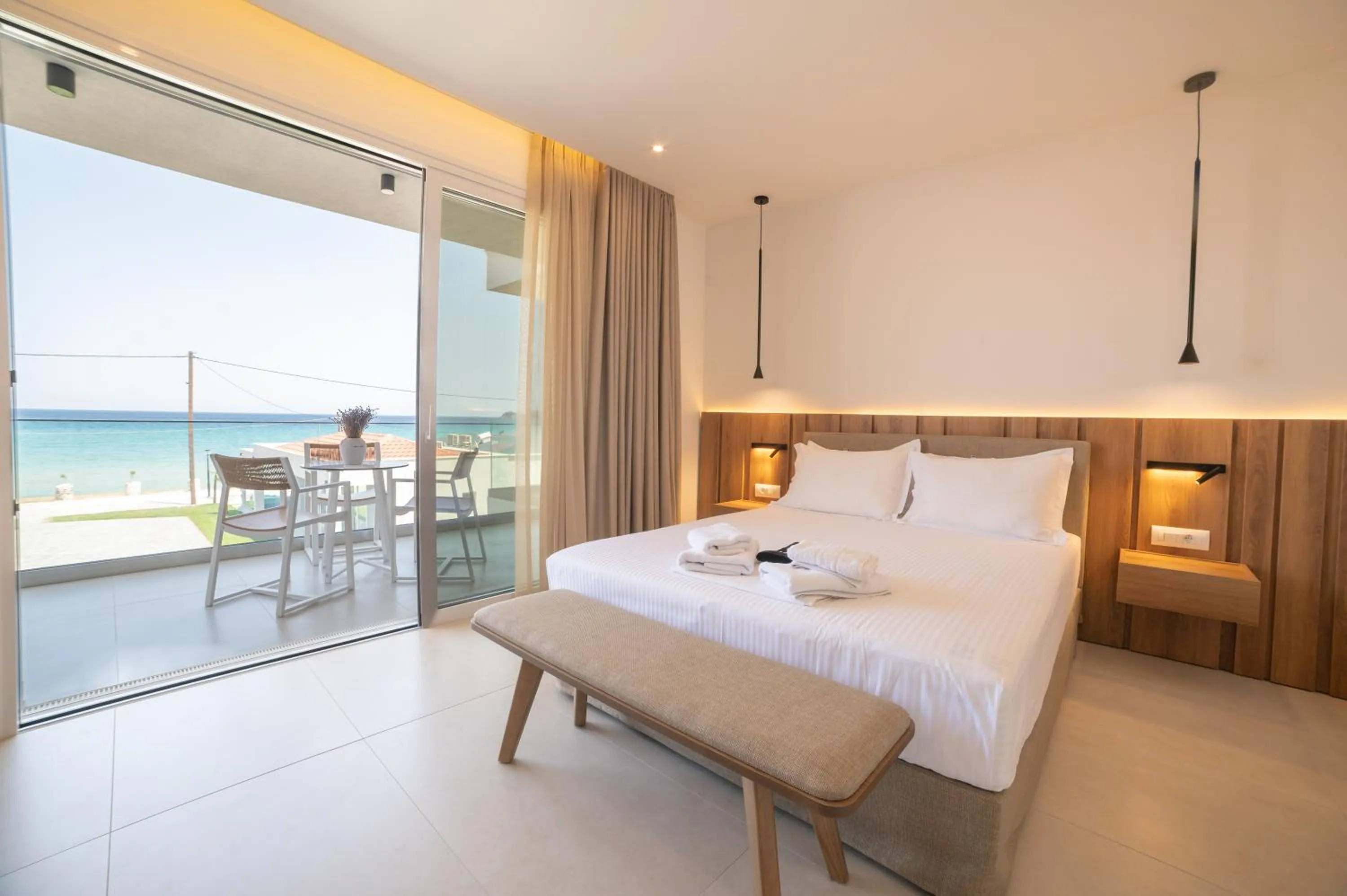 Bed in Sunrise SeaSide Suites