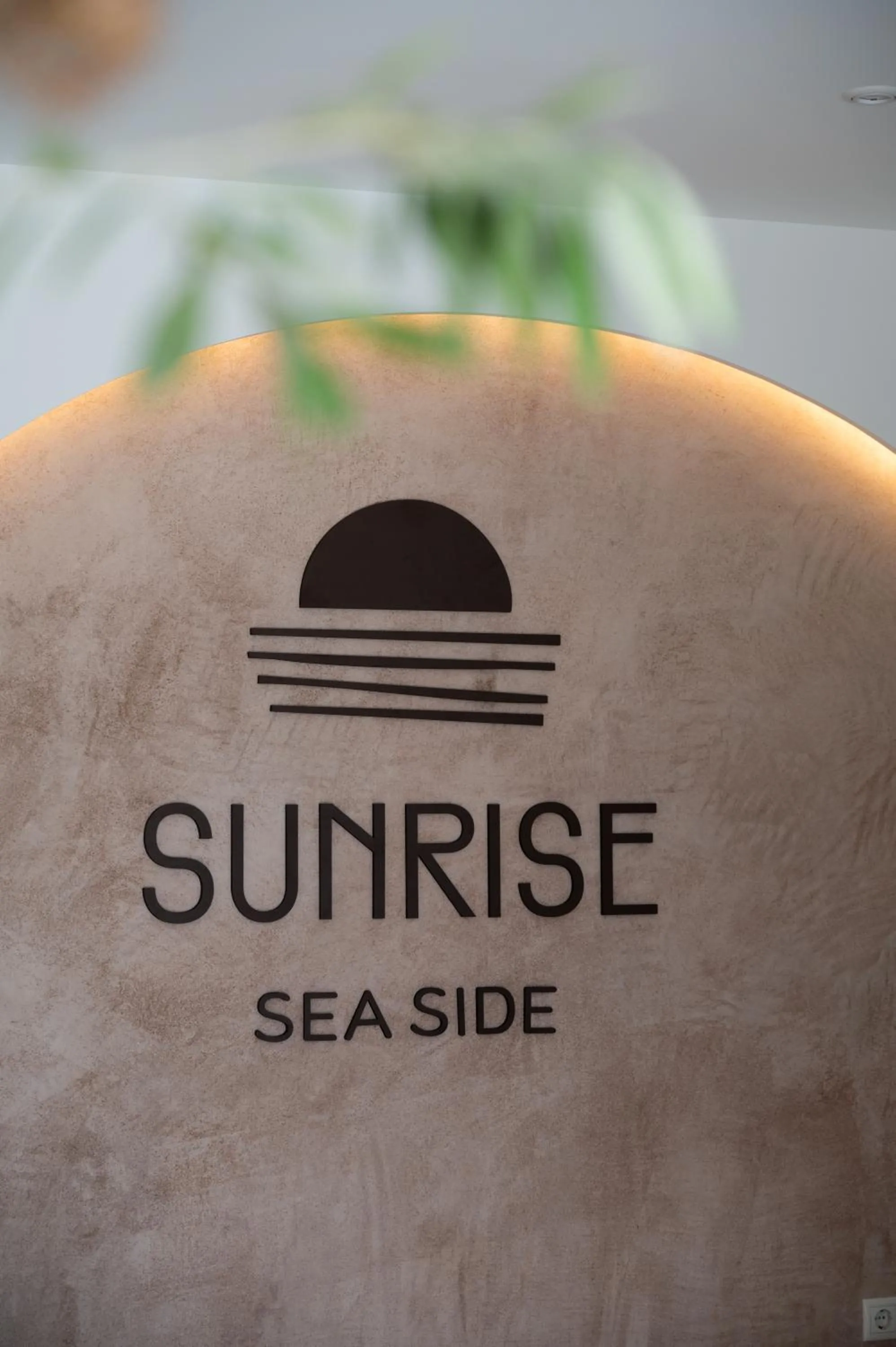 Property logo or sign in Sunrise SeaSide Suites