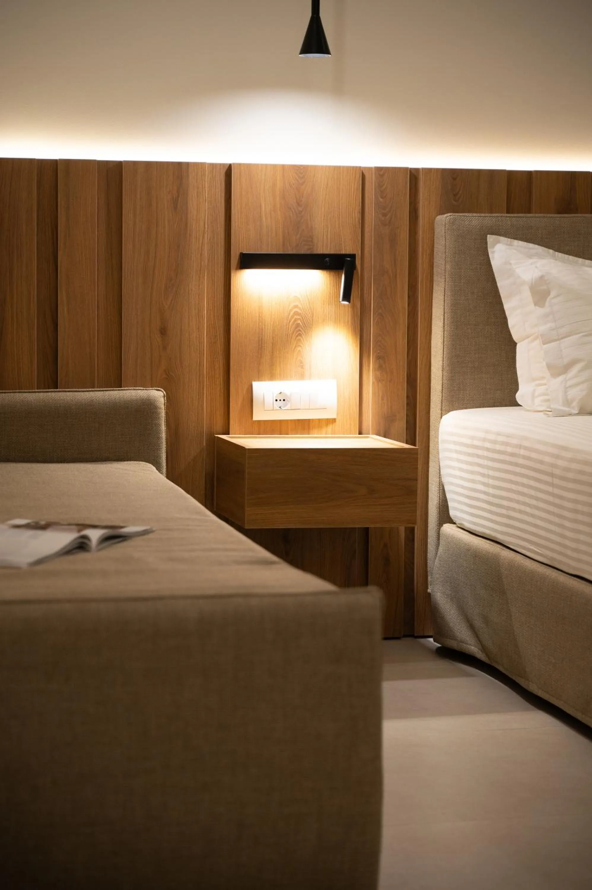 Bed in Sunrise SeaSide Suites