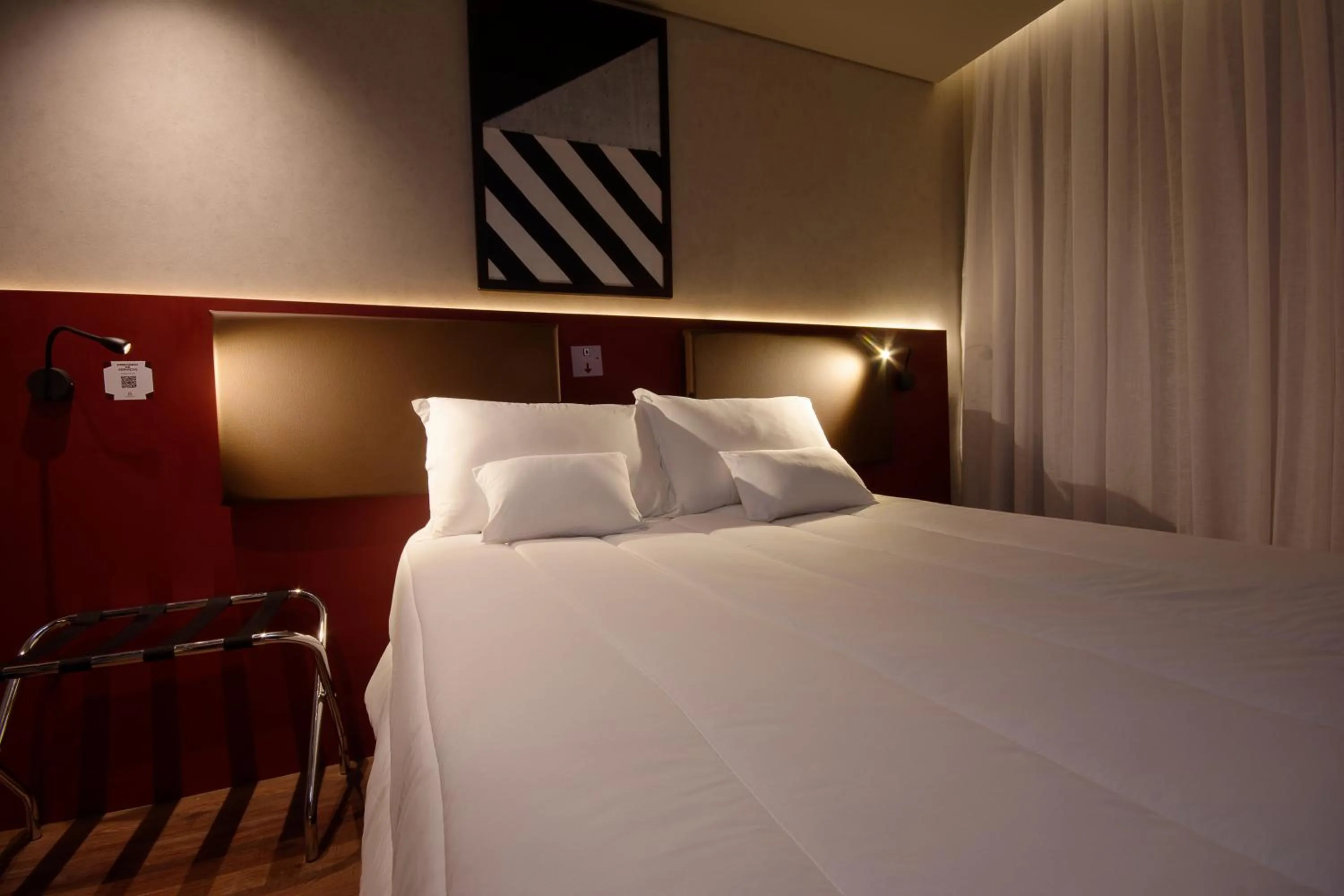 Bed in Golden Tower Express Nações Unidas by Fênix Hotéis