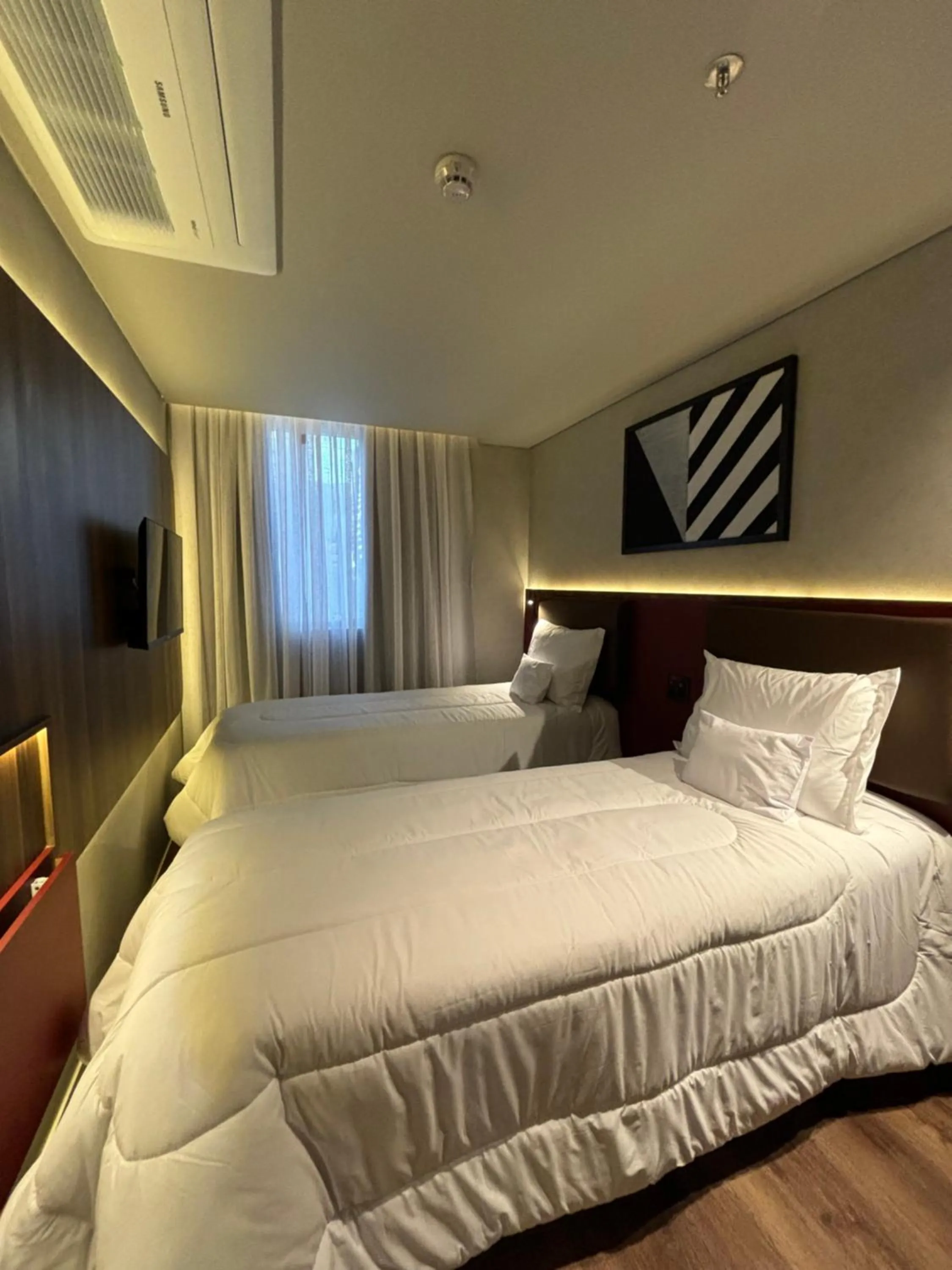 Bed in Golden Tower Express Nações Unidas by Fênix Hotéis