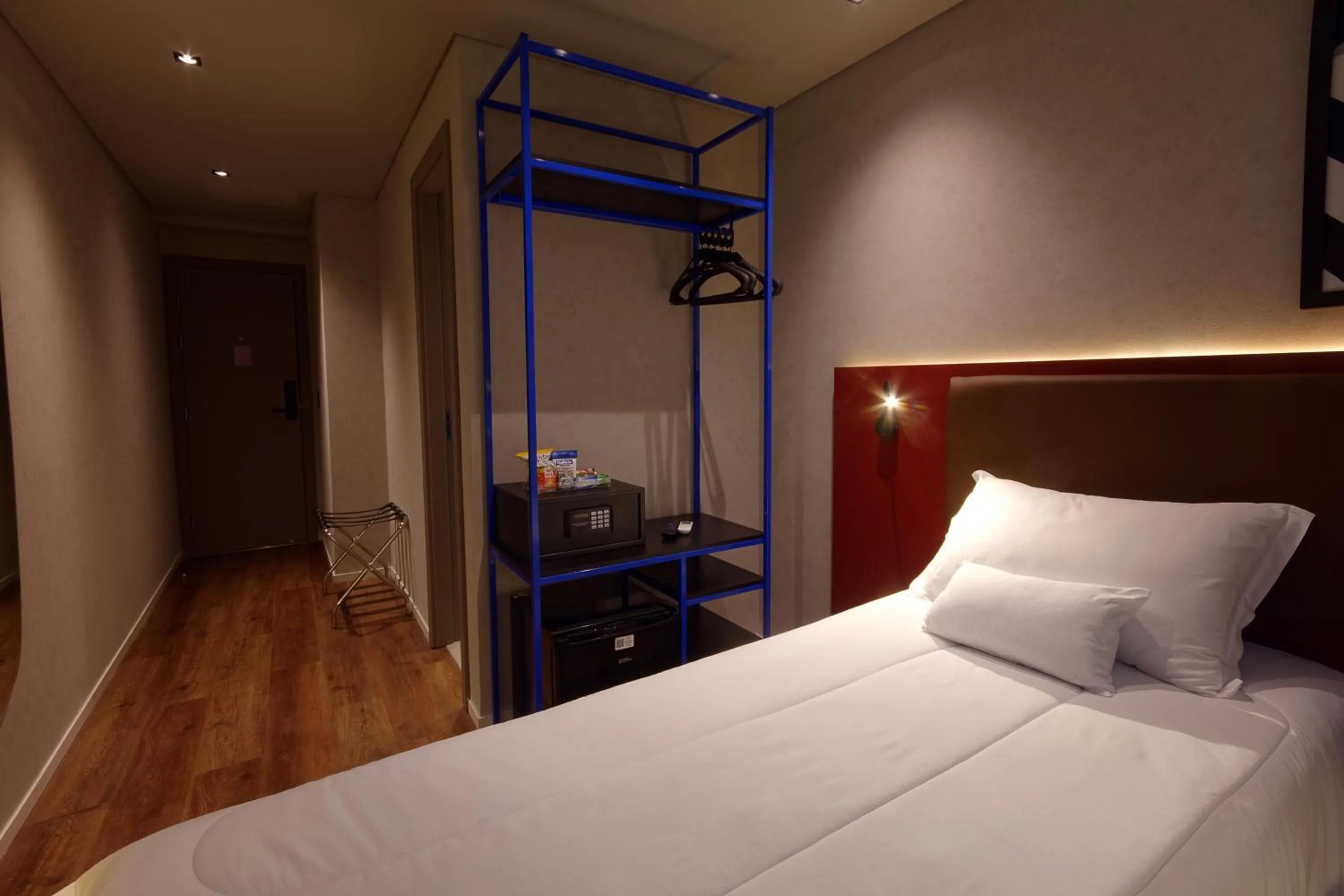 Bed in Golden Tower Express Nações Unidas by Fênix Hotéis