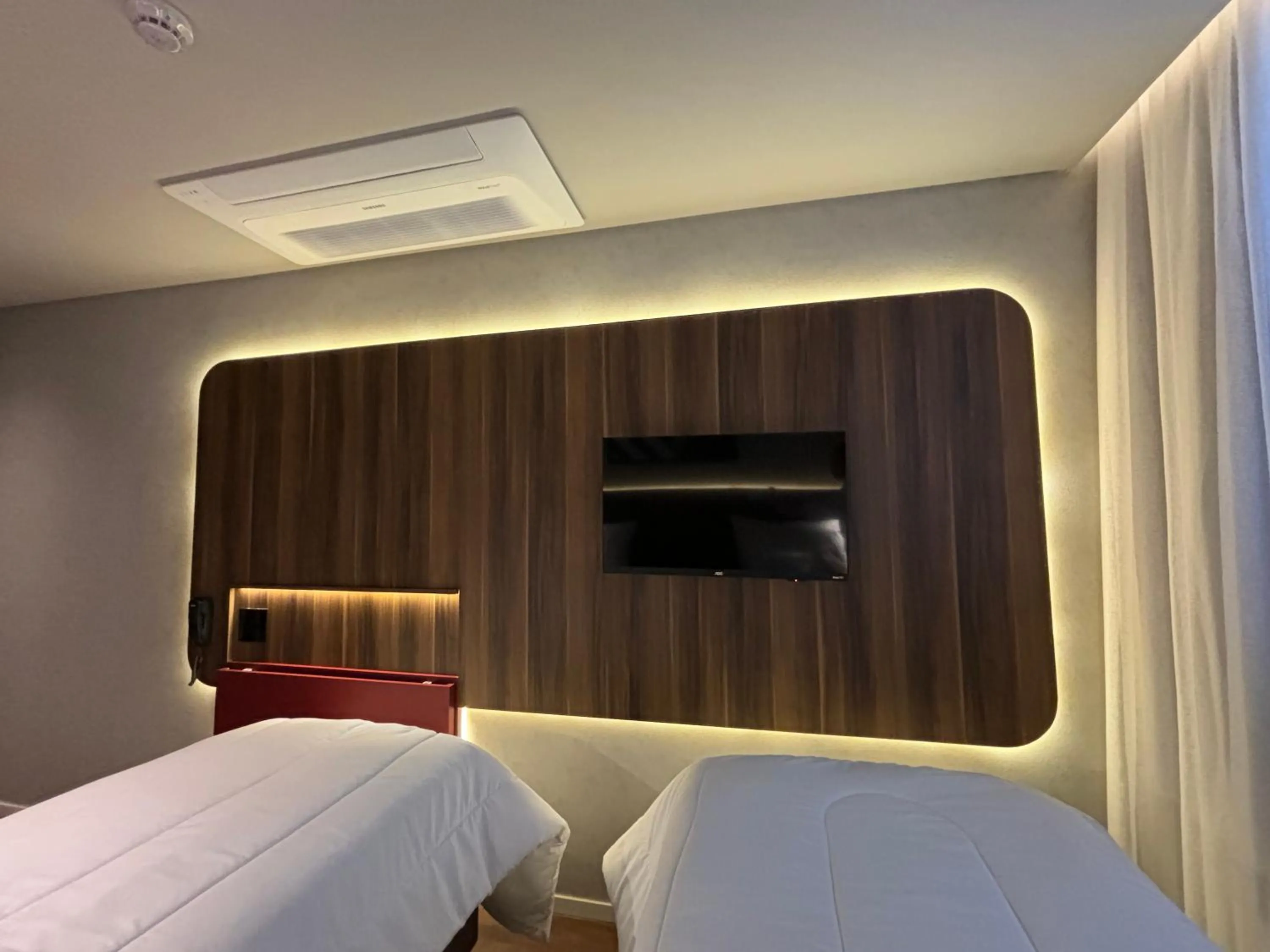 Bed in Golden Tower Express Nações Unidas by Fênix Hotéis