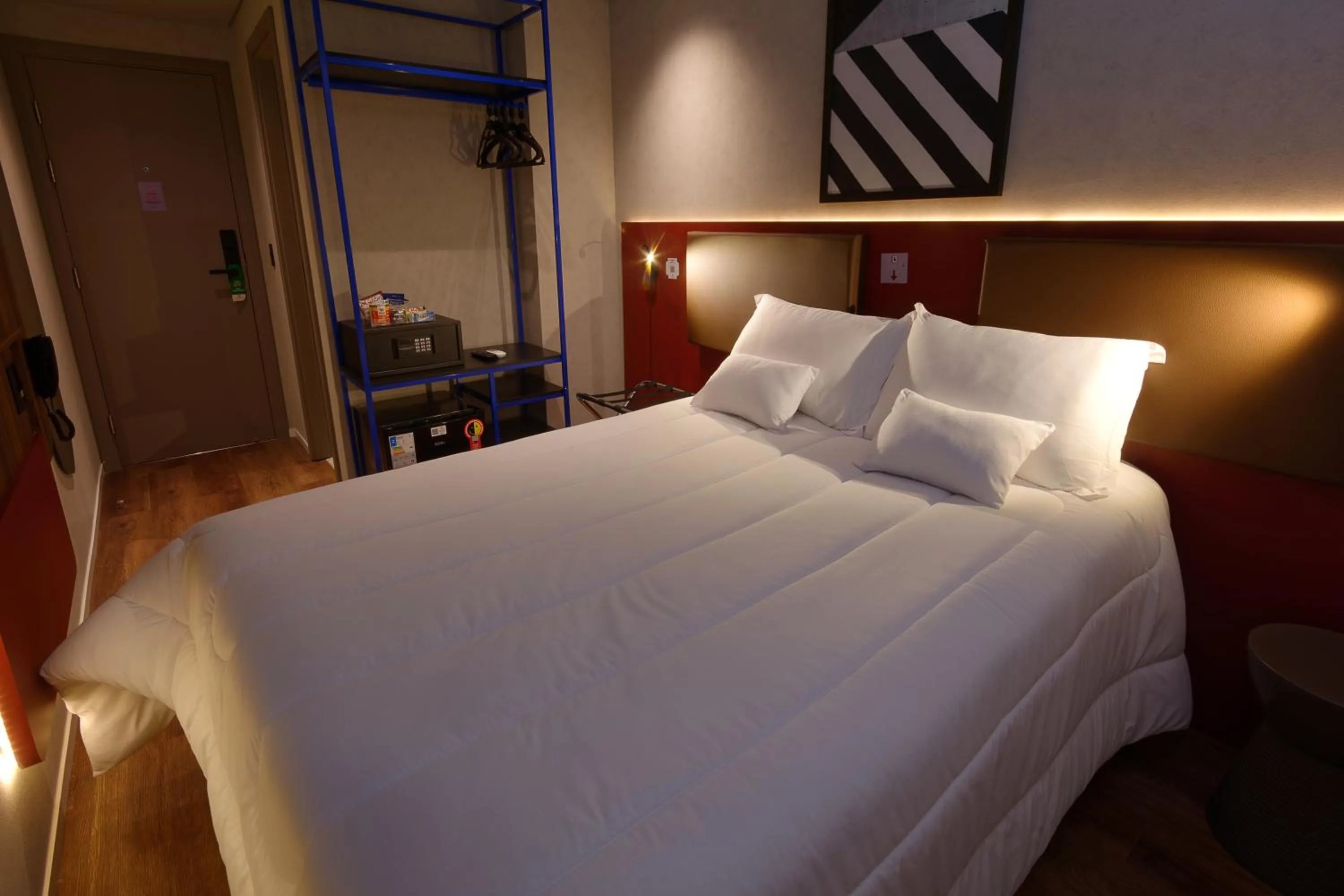 Bed in Golden Tower Express Nações Unidas by Fênix Hotéis