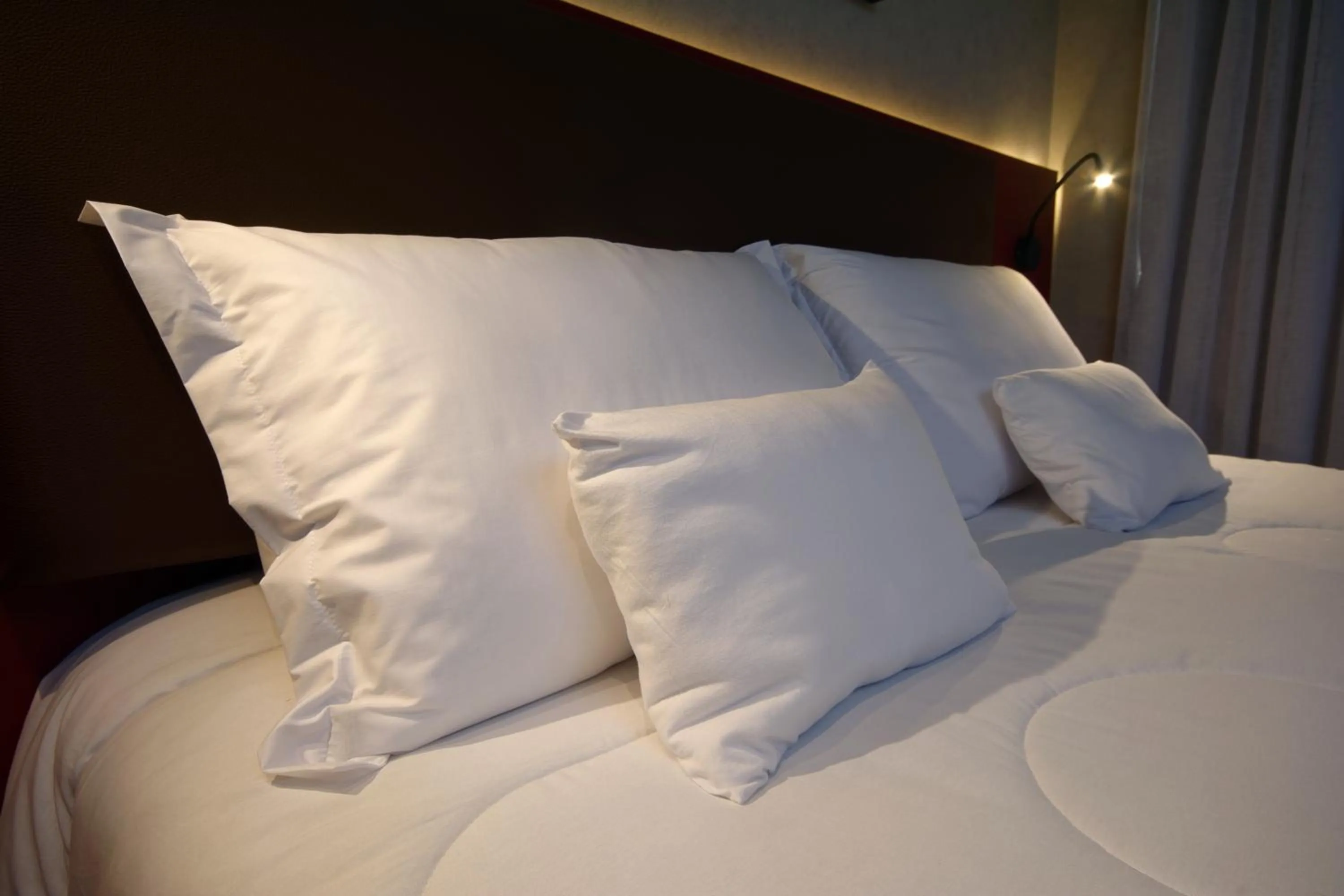 Bed in Golden Tower Express Nações Unidas by Fênix Hotéis