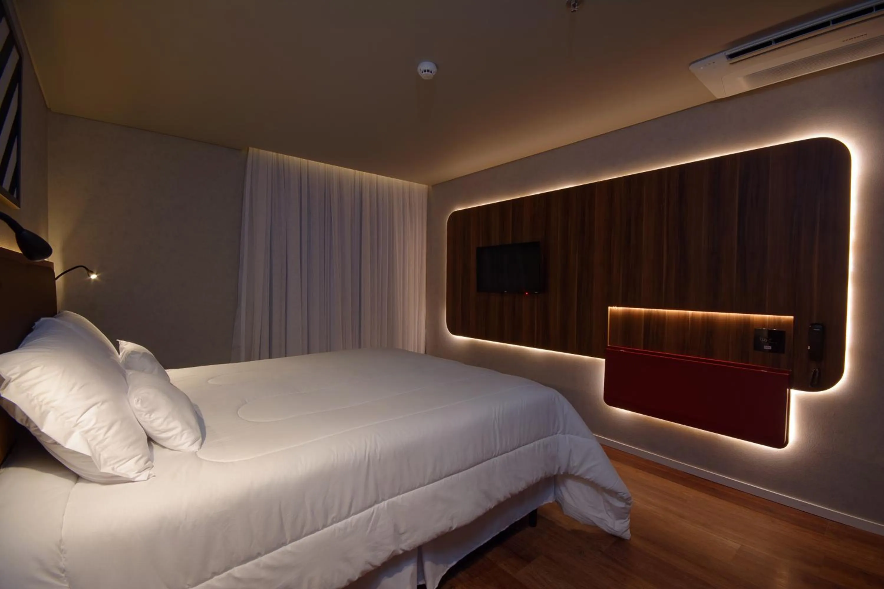 Bed in Golden Tower Express Nações Unidas by Fênix Hotéis