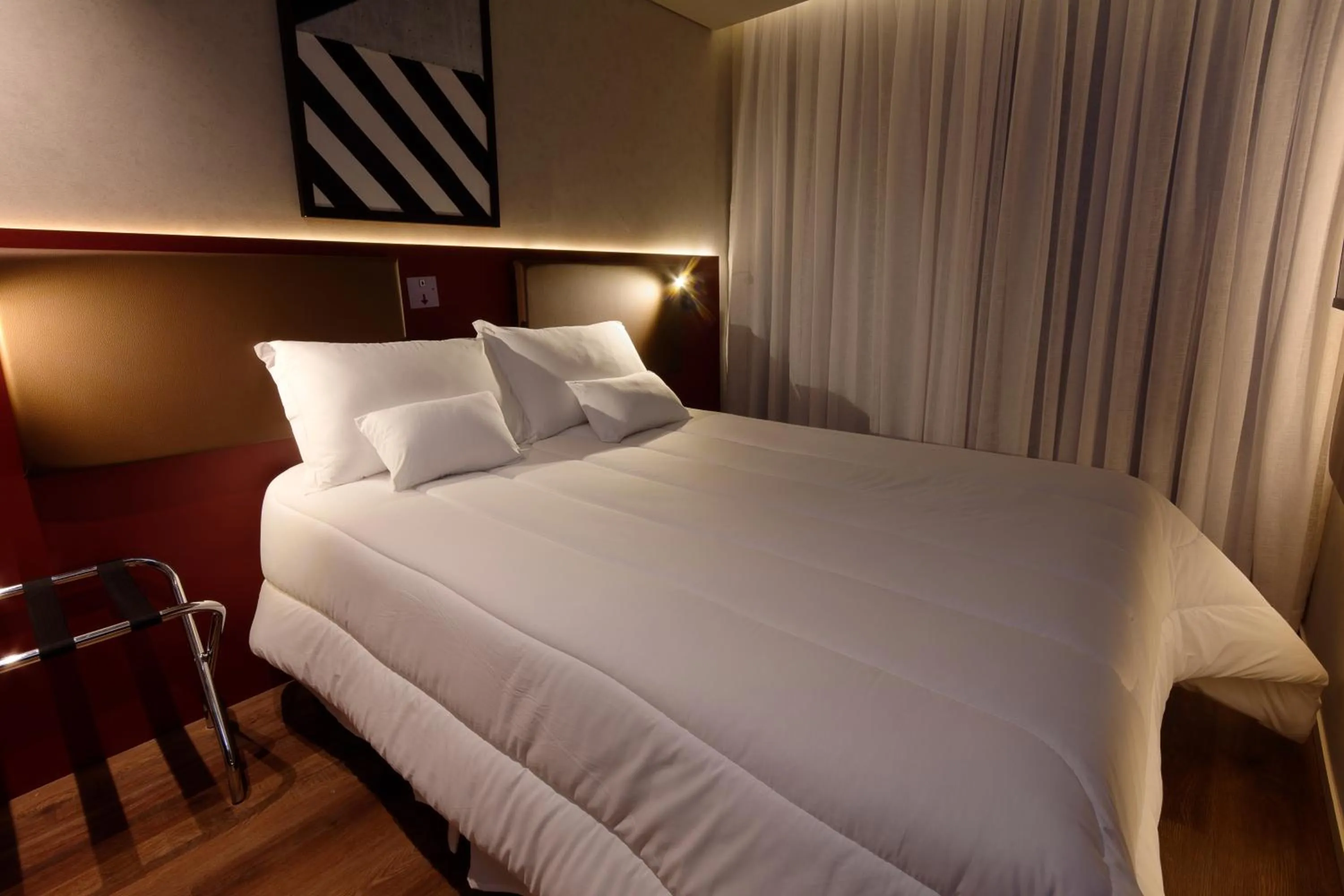 Bed in Golden Tower Express Nações Unidas by Fênix Hotéis