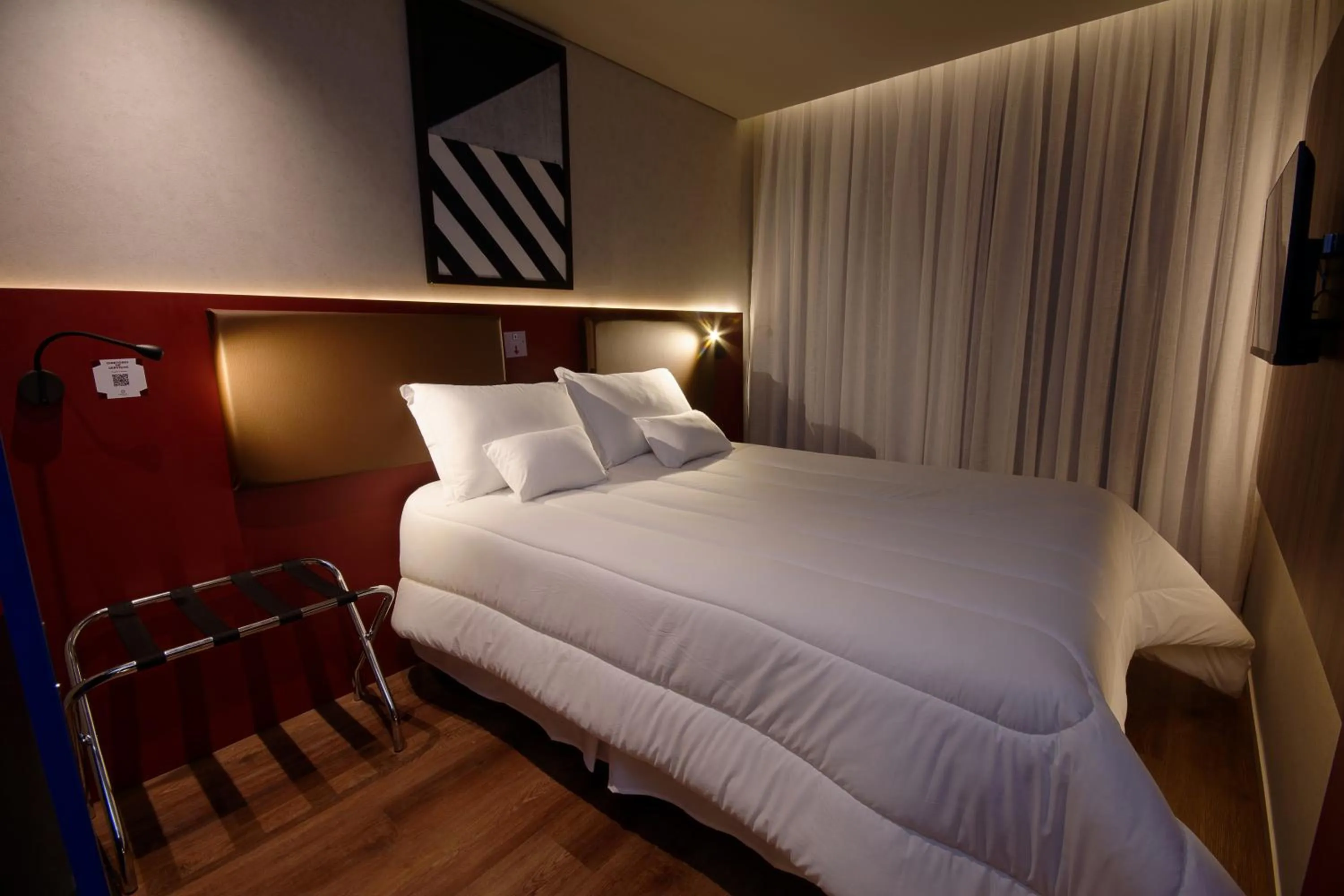 Bed in Golden Tower Express Nações Unidas by Fênix Hotéis