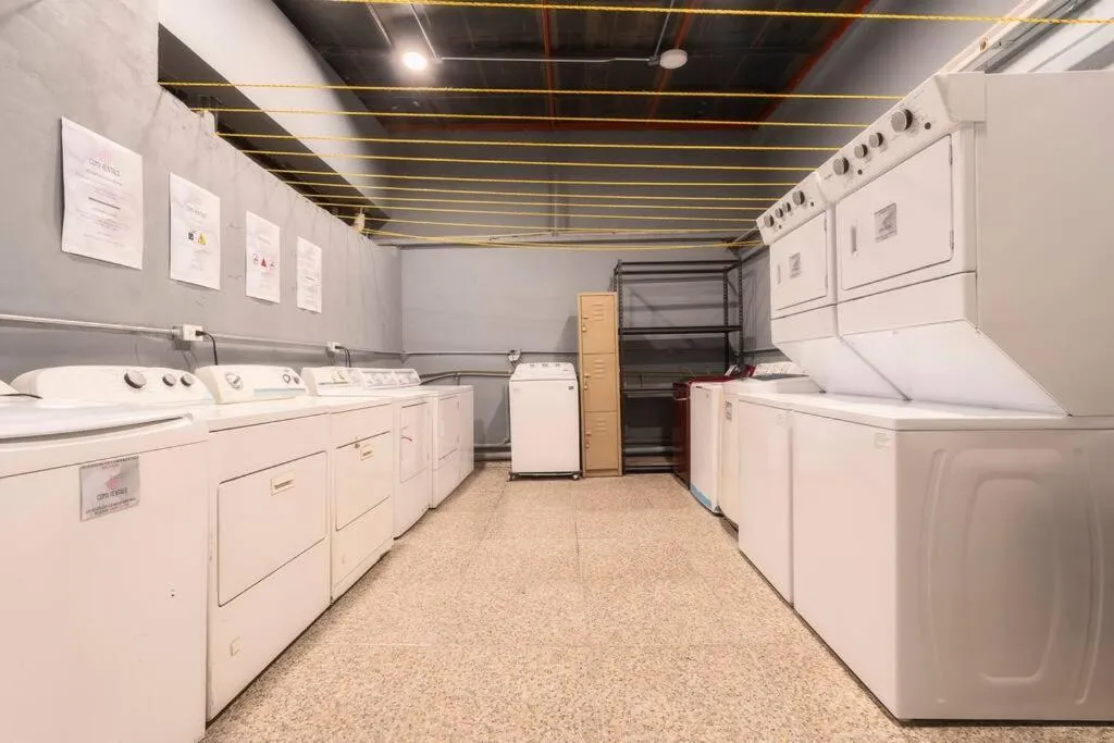 laundry in 301 Historic building 1Bdrm 1bath AC Rooftop