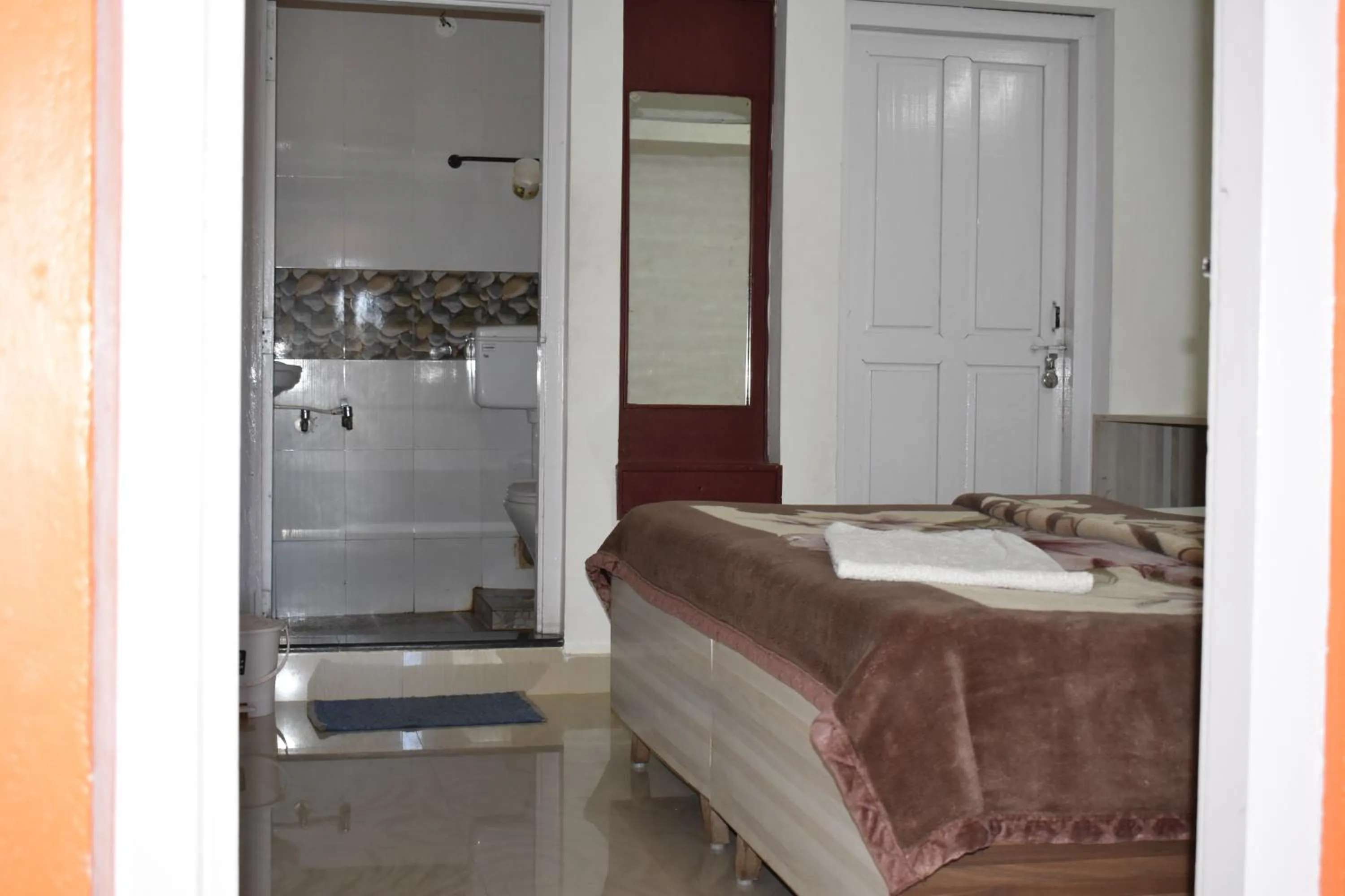 Bed in Hotel Sri Balaji