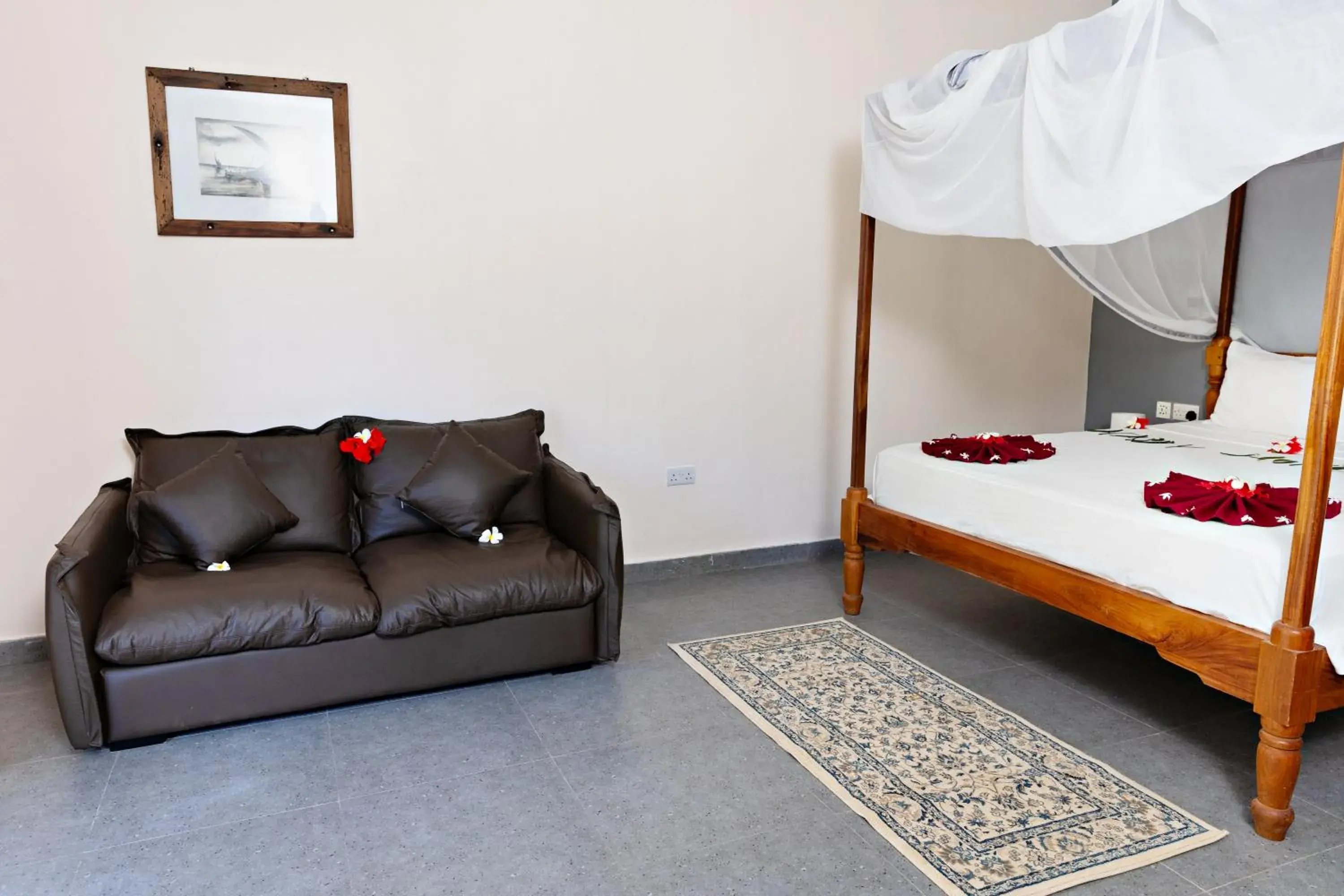 Seating area, Bed in Tanzanite Beach Resort Seating area, Bed in Tanzanite Beach Resort