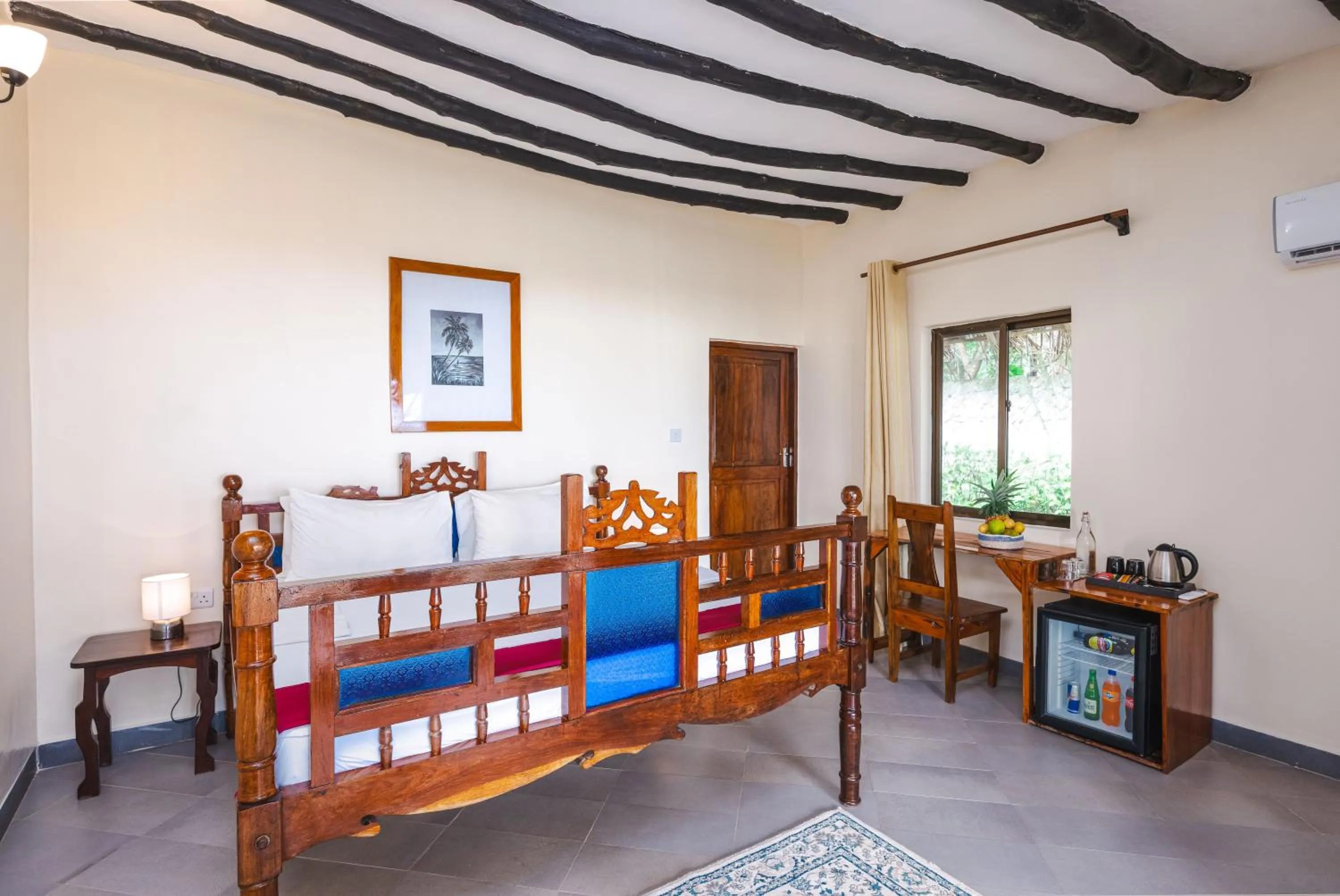 Bed in Tanzanite Beach Resort