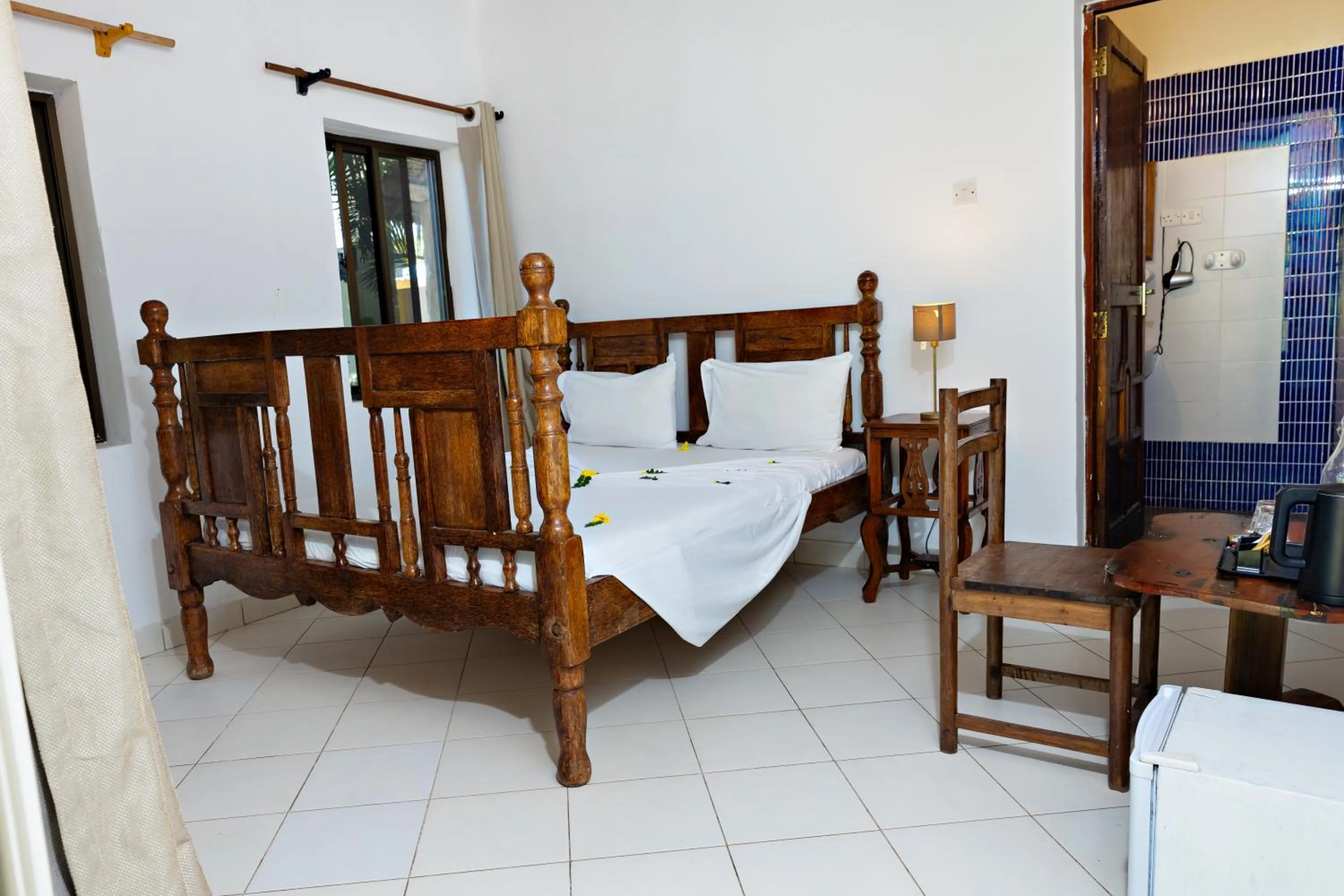 Bed in Tanzanite Beach Resort