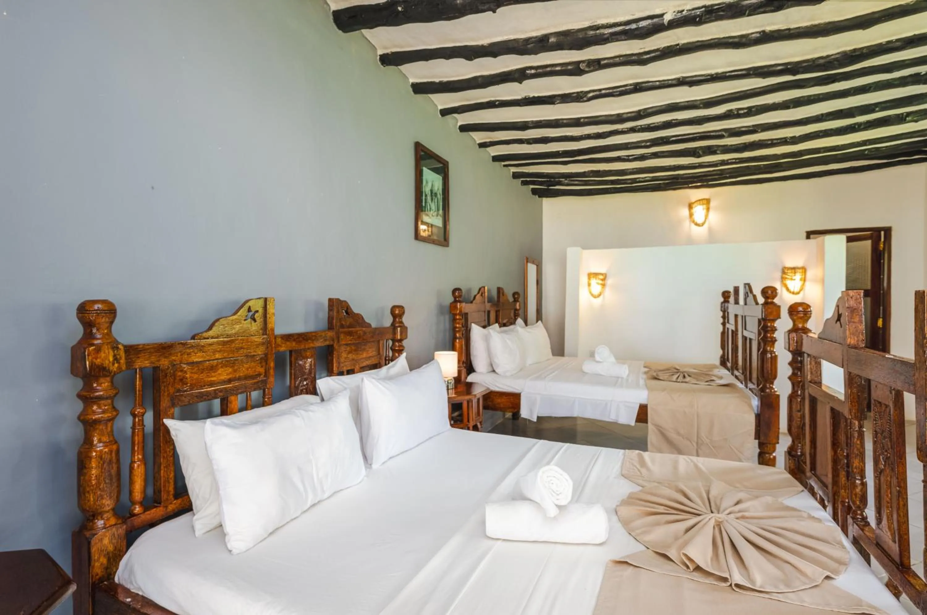 Bed in Tanzanite Beach Resort